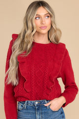 Front view of this sweater that features a scoop neckline.