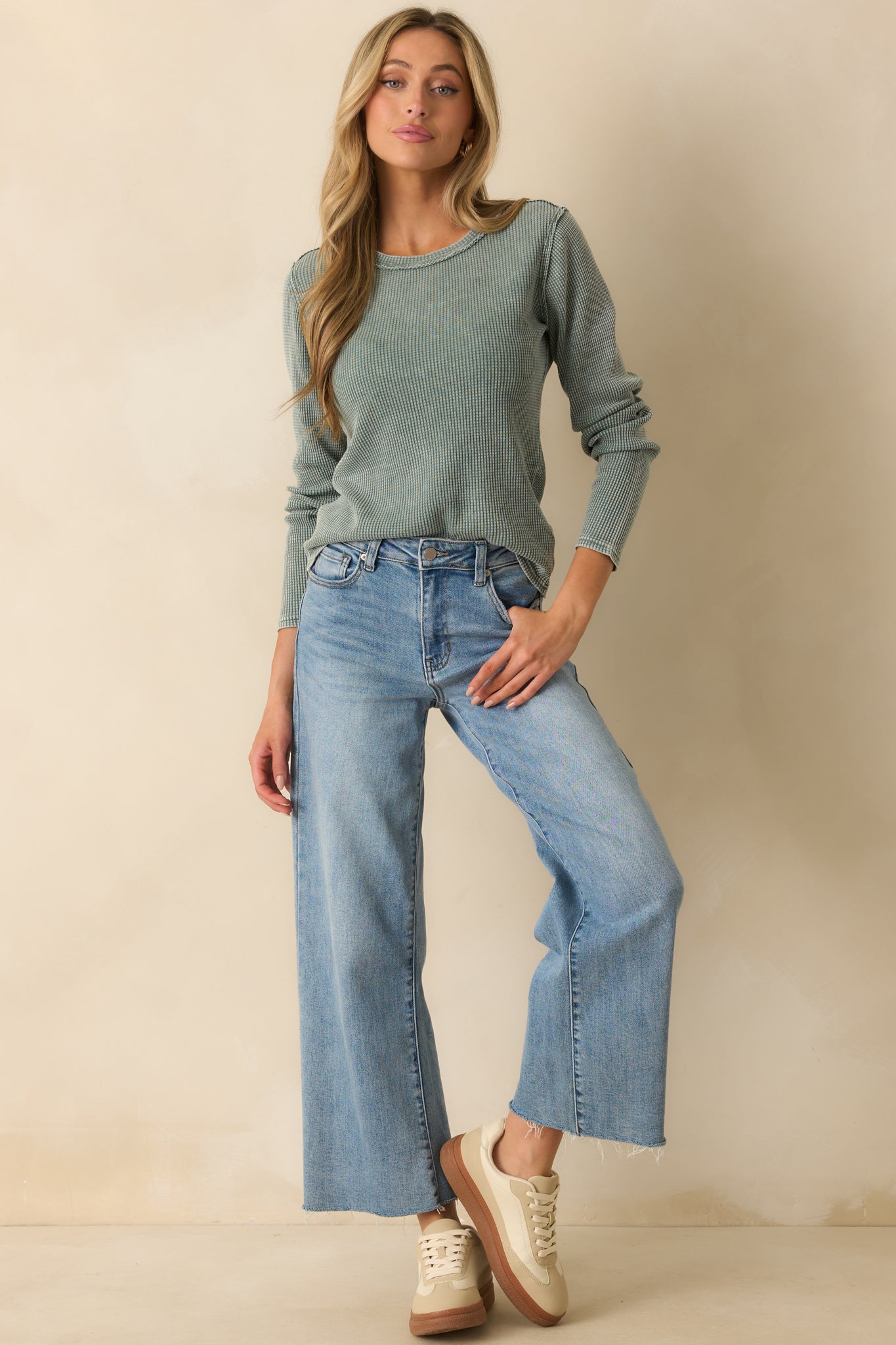 Full-length front view of sage green thermal top showing straight hem and cozy knit texture.