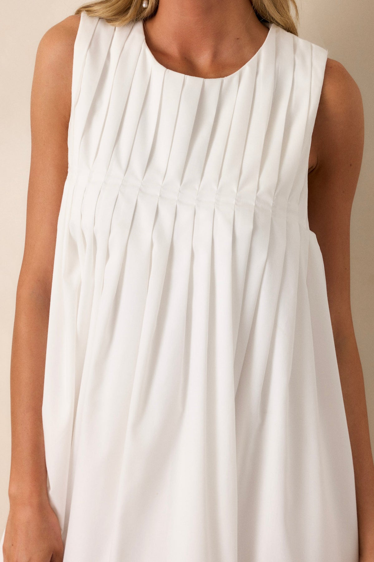 PLEATED MINI DRESS IN WHITE