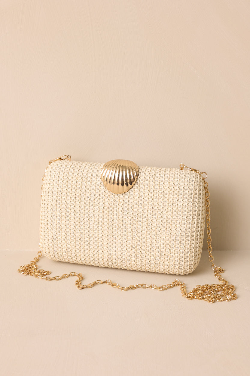 IVORY WOVEN CLUTCH W/ SEASHELL CLASP
