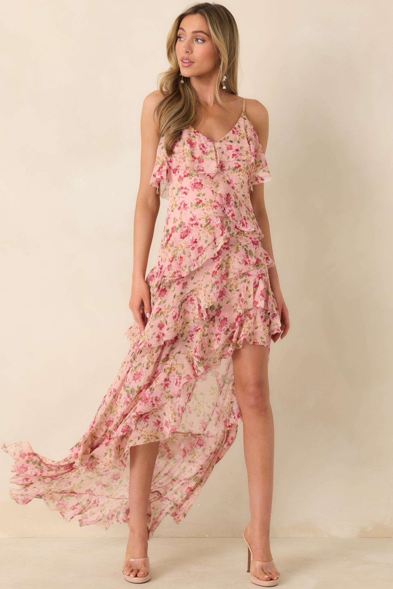 Airy silhouette featuring delicate adjustable straps and a breezy skirt that creates effortless, feminine movement.