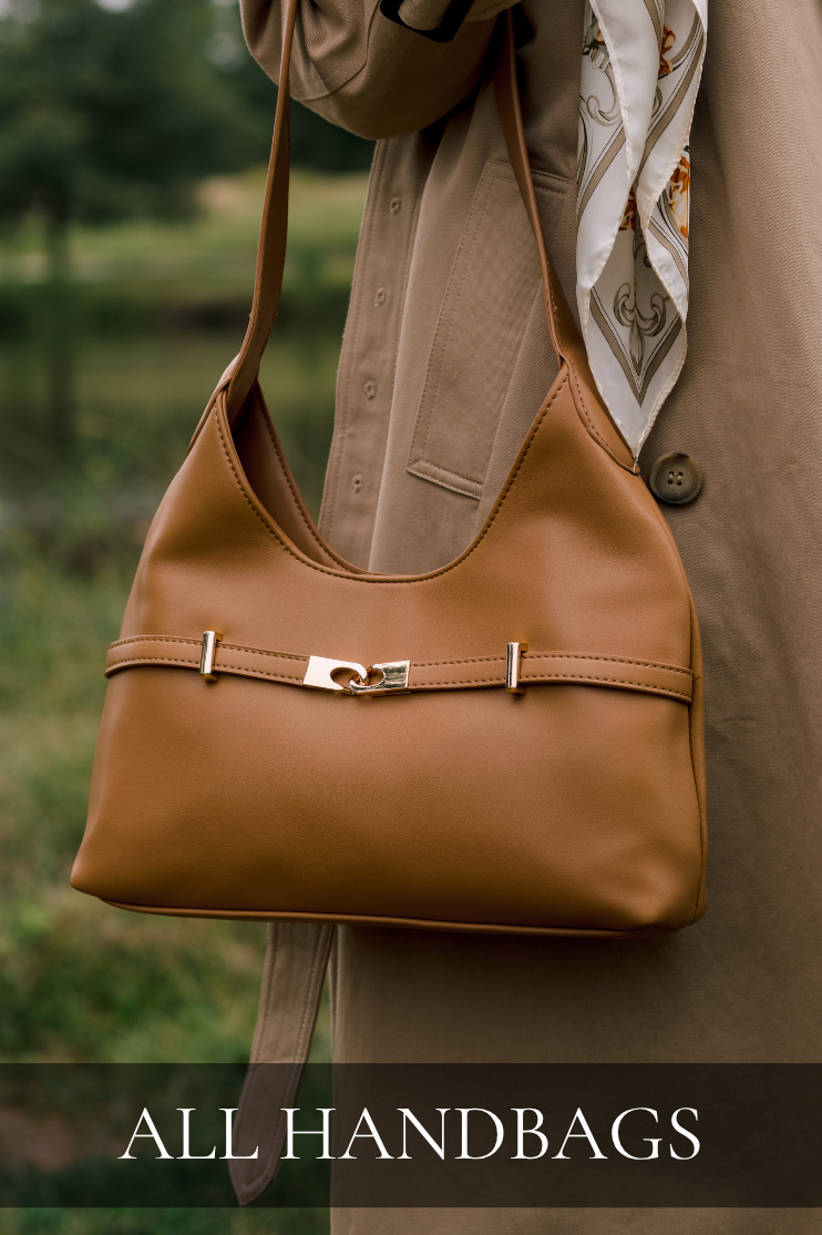 Model holding a tan handbag. Text reads: "All Handbags."