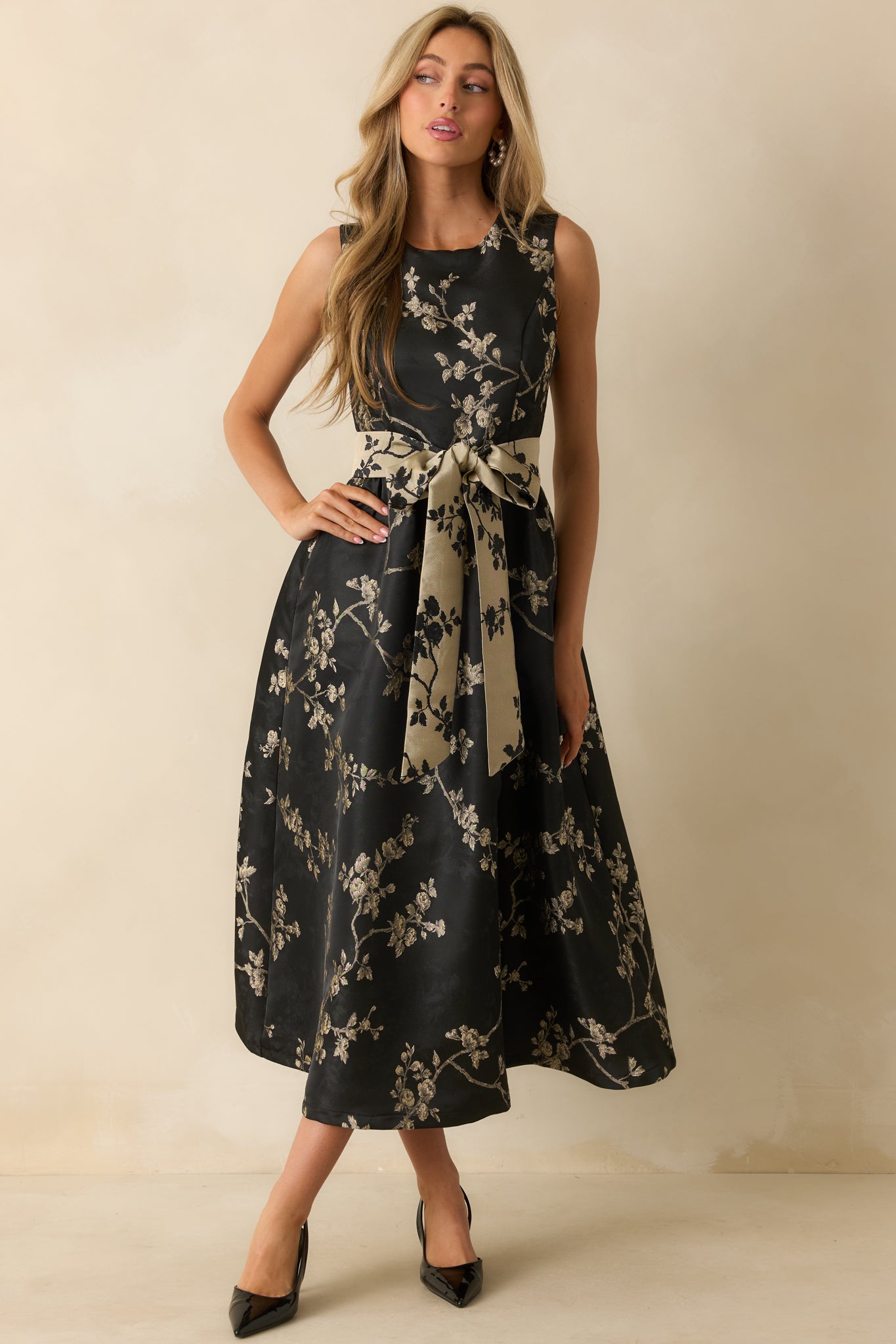 Slight angled front view emphasizing the refined texture and polished silhouette with the removable belt.