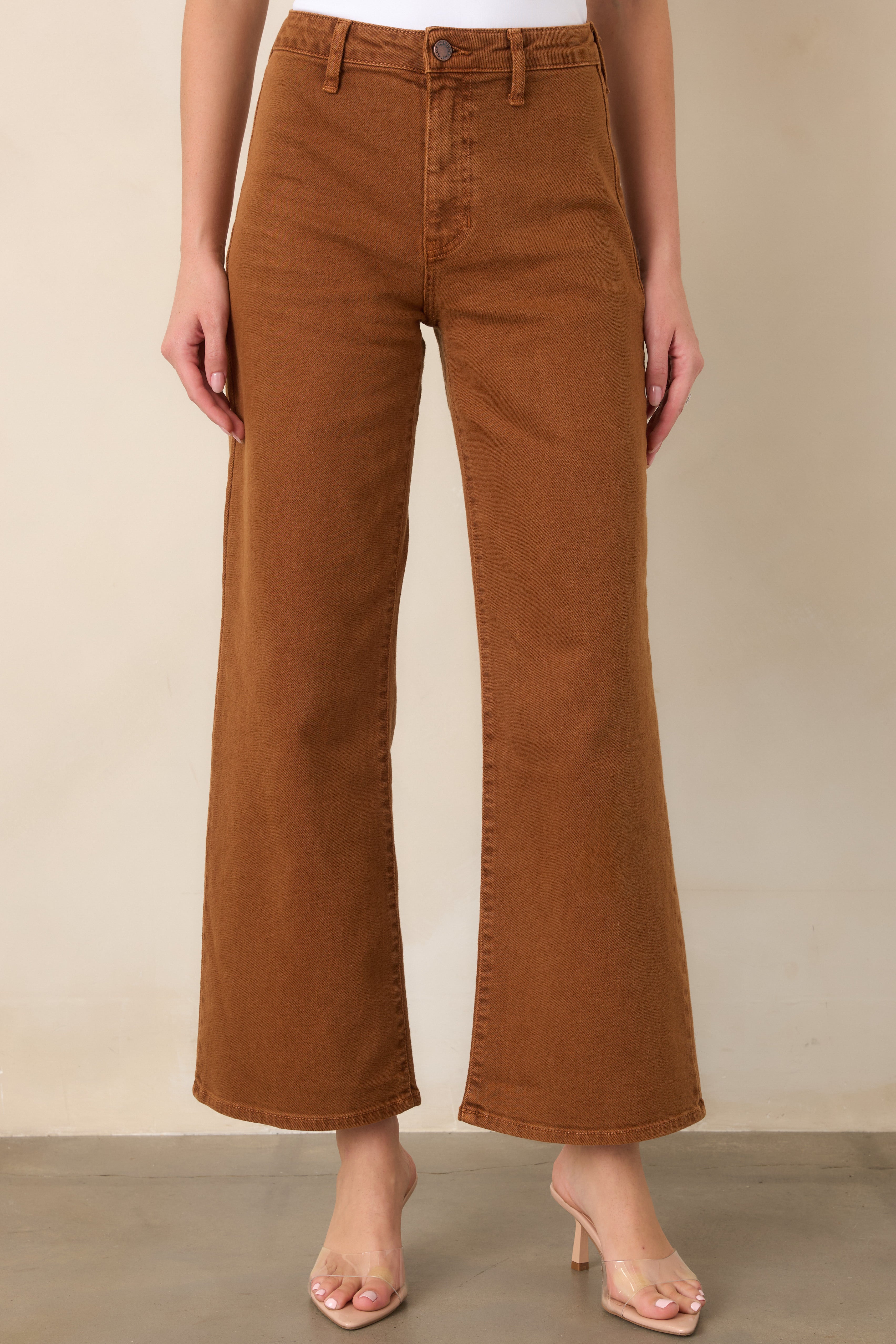 Close view of the ankle-grazing wide-leg hem and soft structured denim fabric, showcasing the pants’ easy, relaxed shape.