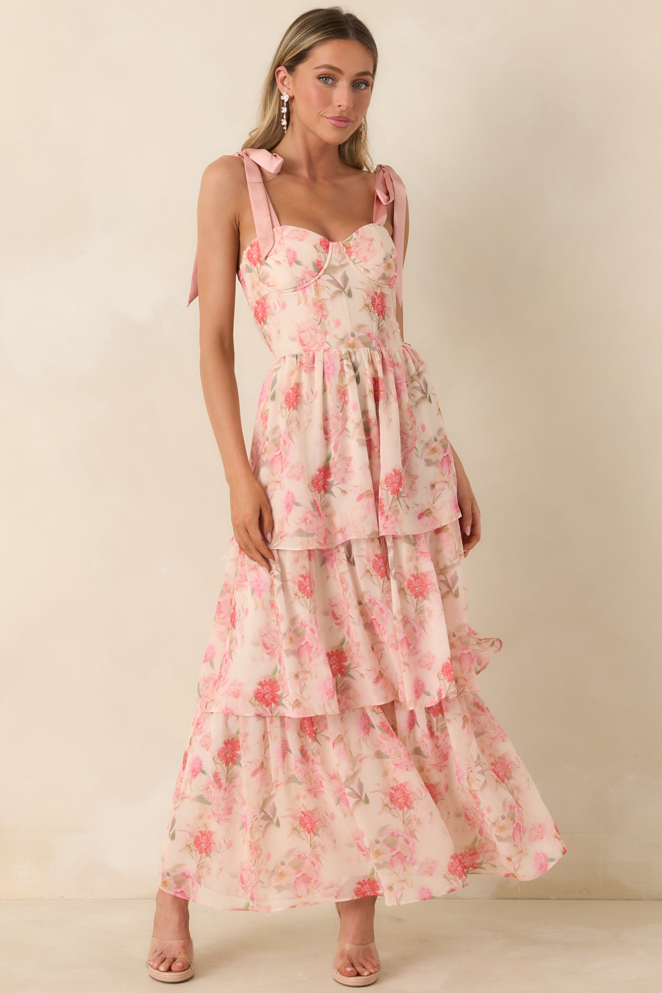 Ankle-length chiffon dress with tie shoulder straps, sweetheart neckline, and tiered skirt.