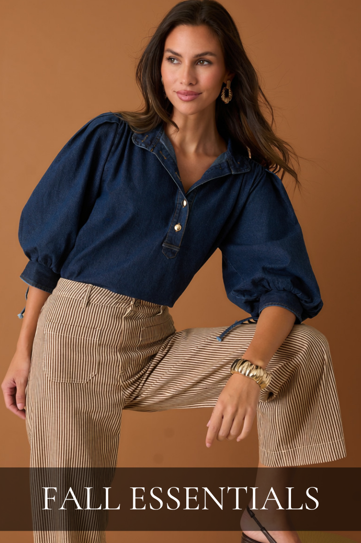 Model wearing a denim top and striped pants. Text reads: "Fall Essentials."