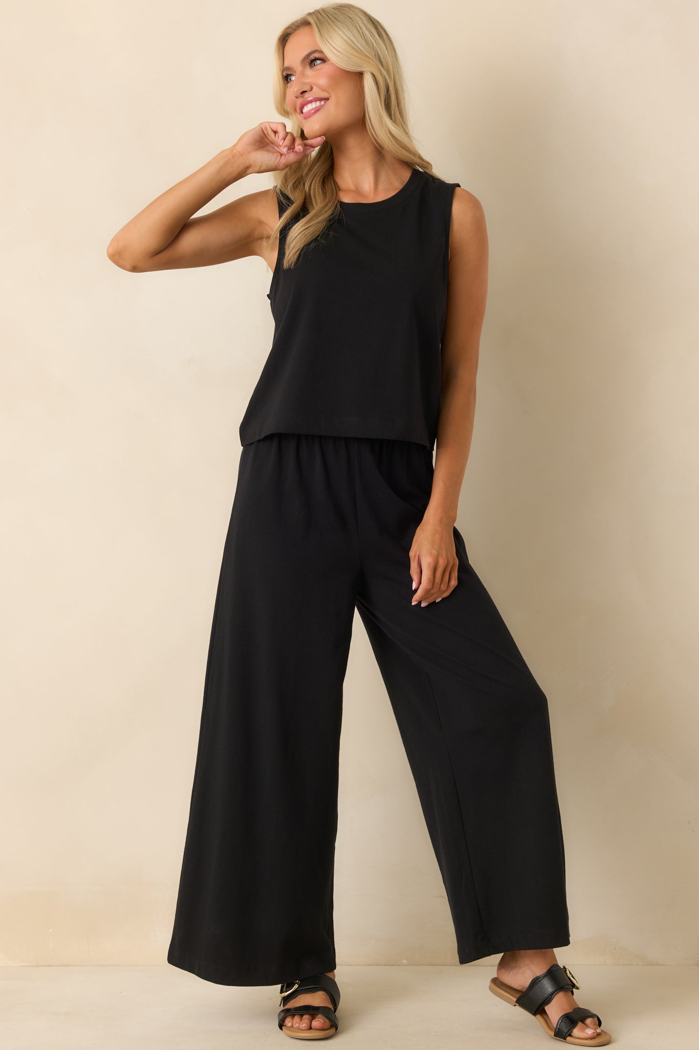 A complete shot highlighting the flow of the relaxed fit and structure of the elastic waistband.