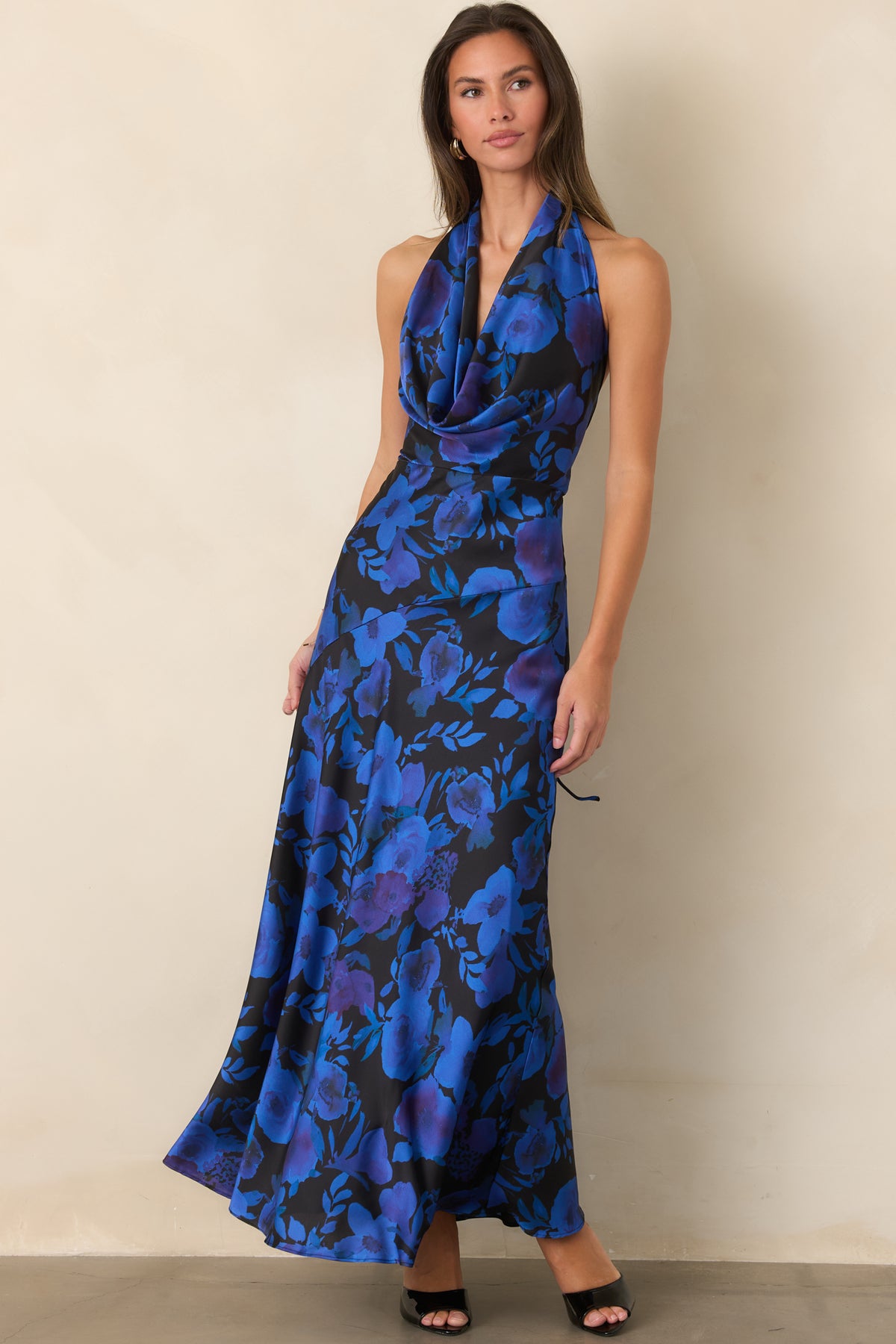 Black floral satin maxi dress with a plunging cowl neckline and graceful A-line skirt.