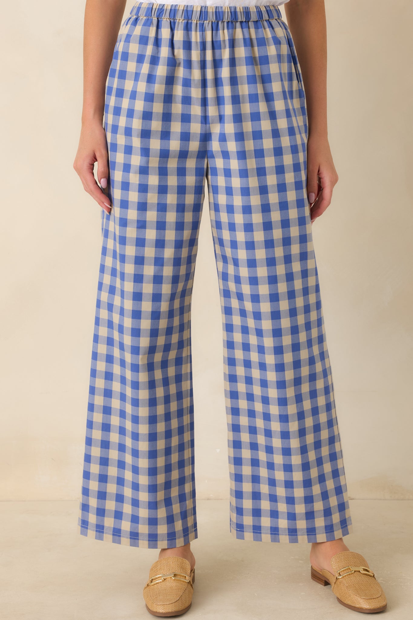 Classic blue and beige gingham pattern stands out across the lightweight cotton fabric of these wide leg pants.
