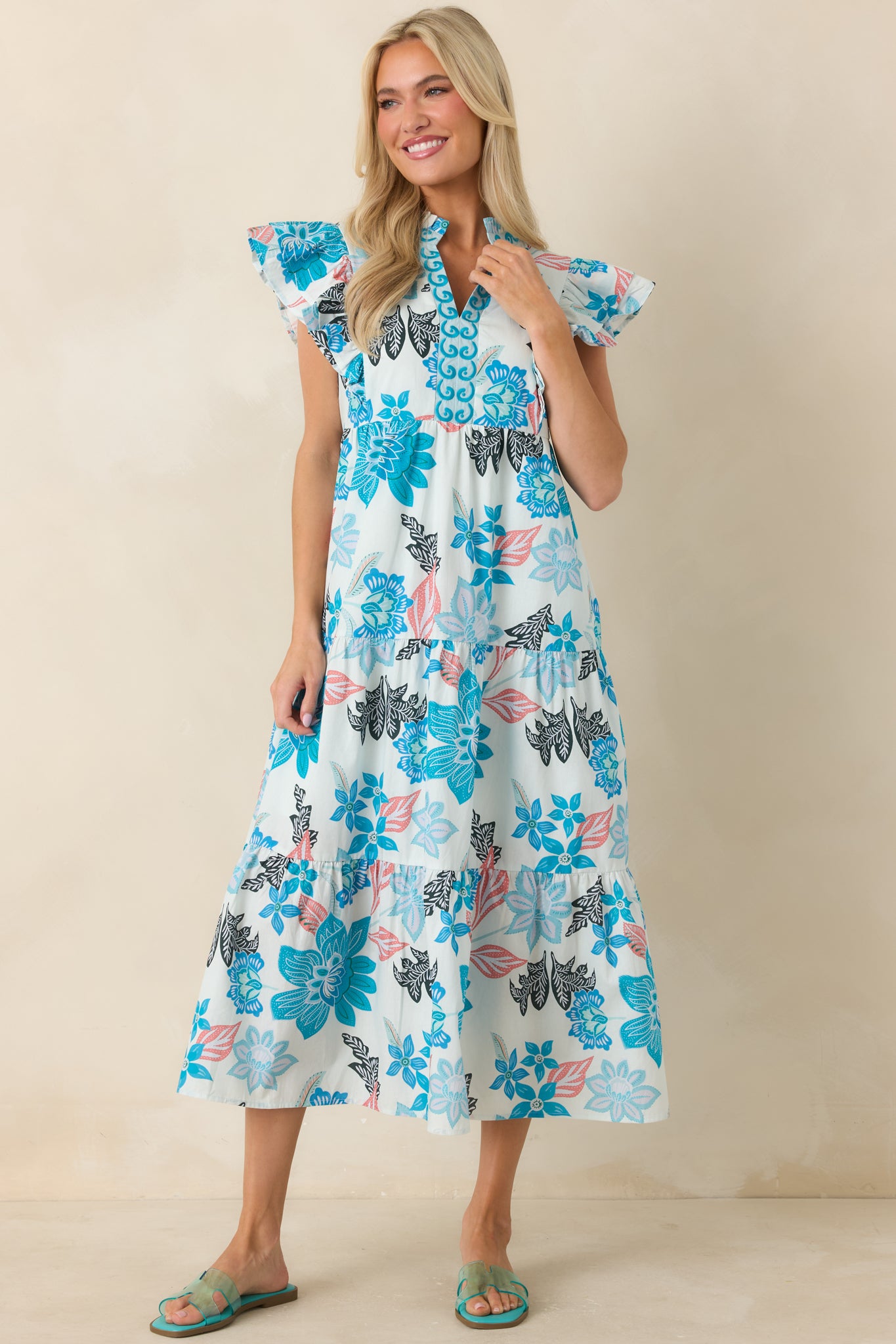 Relaxed blue floral midi dress showcasing a ruffle collar, flowy tiers, and lightweight fully lined design.