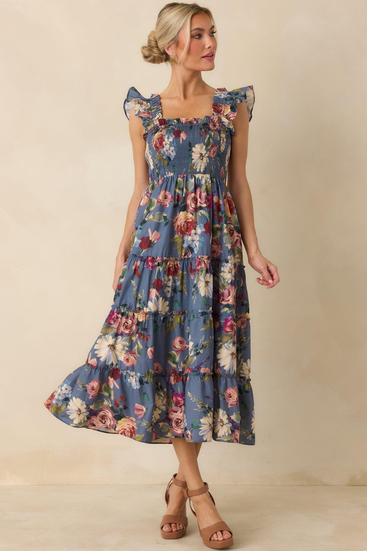 Painterly floral midi dress featuring ruffled shoulder straps, a flexible smocked bodice, and multiple gathered skirt tiers.