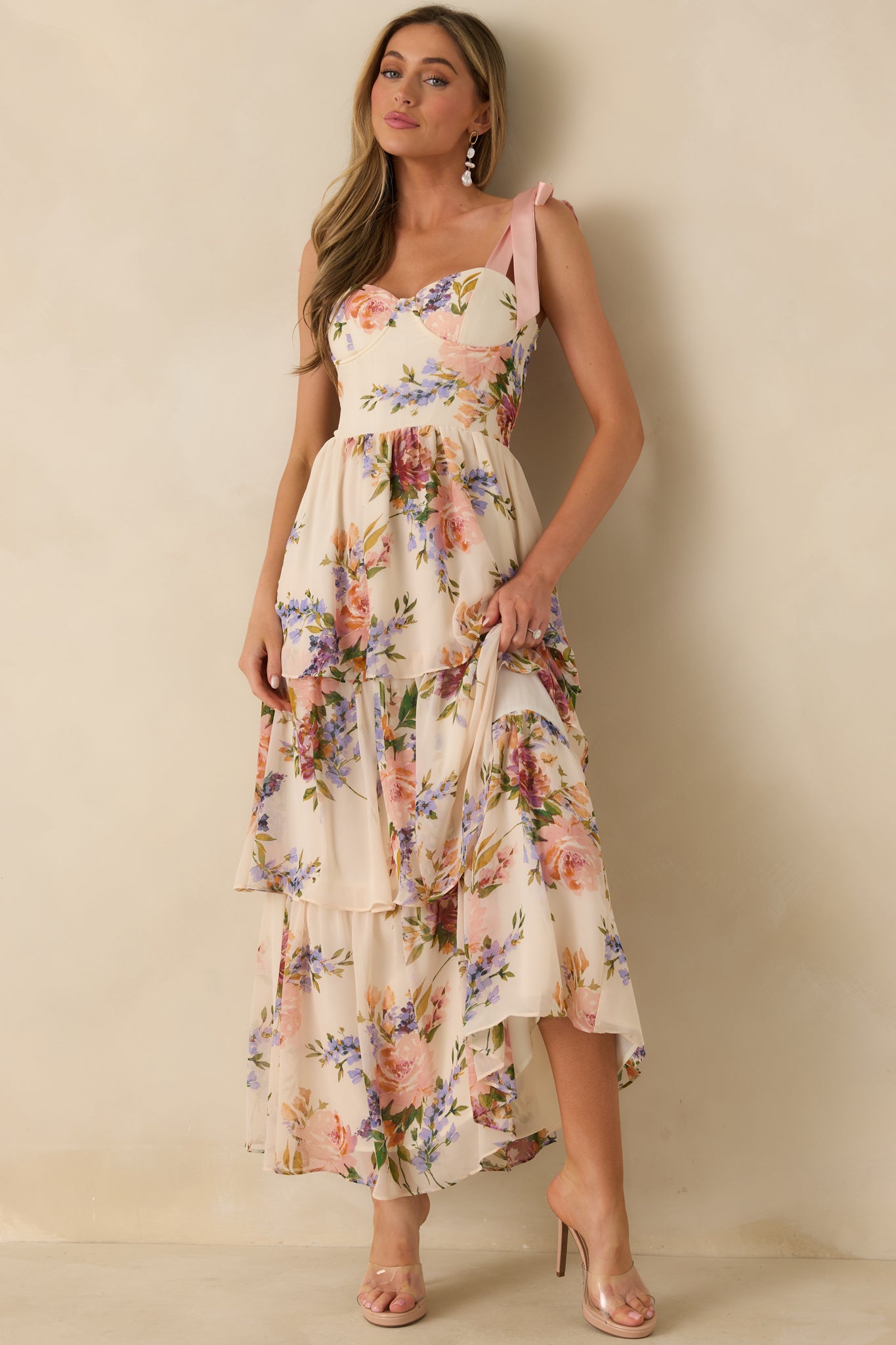 Blush pink multi floral chiffon maxi dress with adjustable tie shoulder straps and a sweetheart neckline.