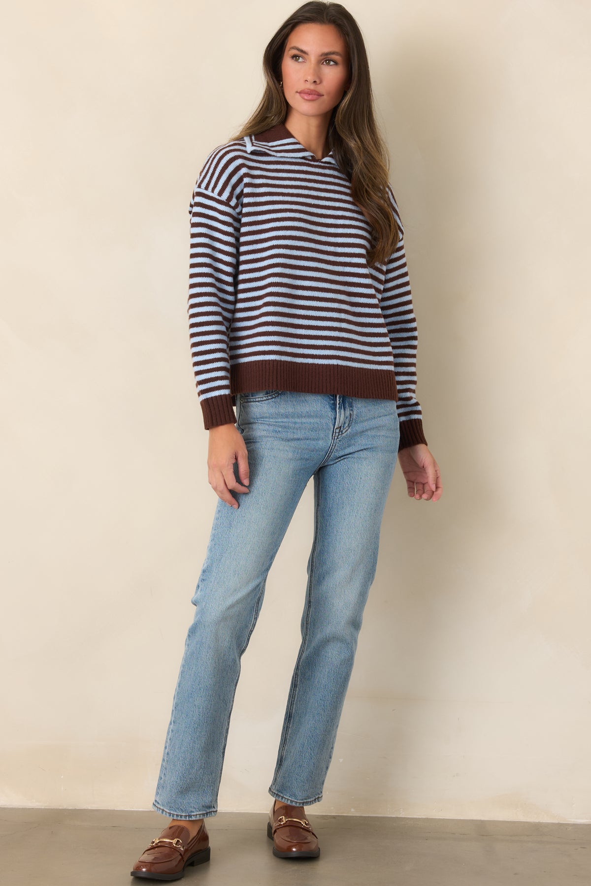 Slightly boxy striped silhouette accented by solid chocolate brown ribbed detailing throughout.
