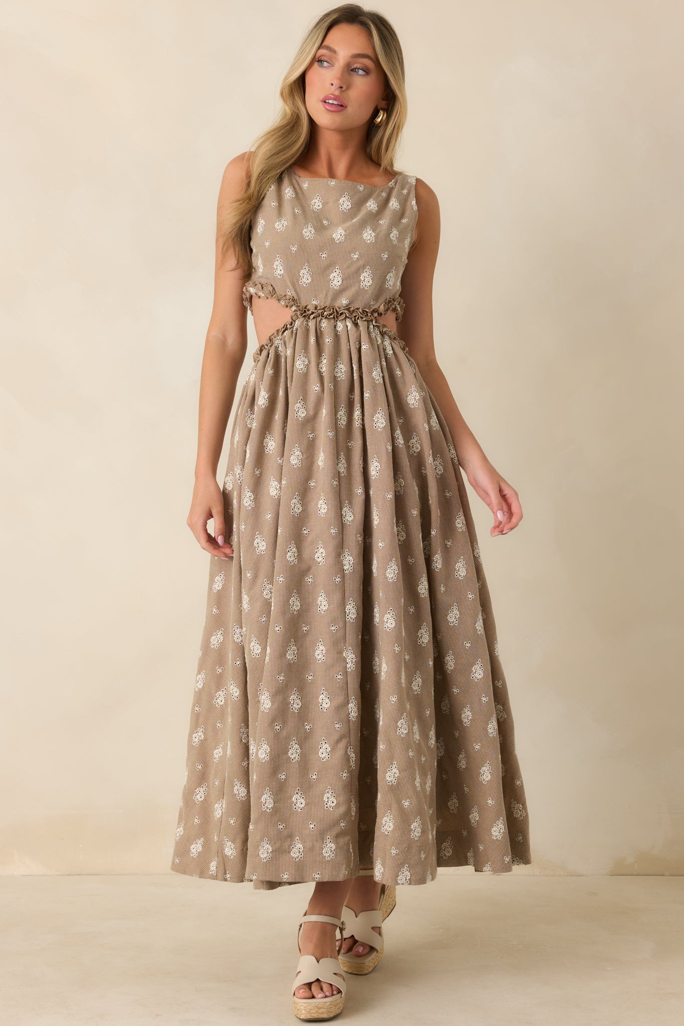Full-length view highlighting the breathable cotton construction, boat neckline, and soft movement of the floral eyelet maxi dress.
