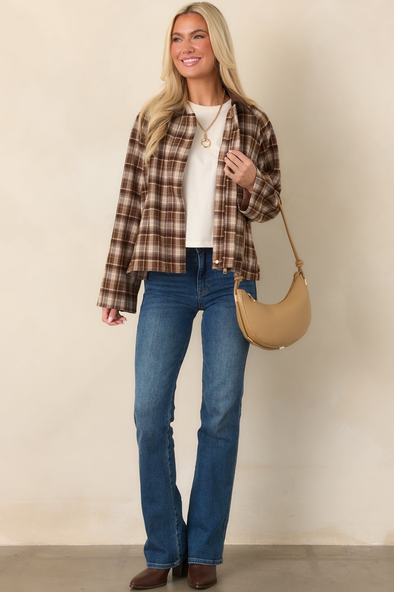 Boxy brown plaid jacket showcasing the contrasting corduroy collar, relaxed sleeves, side pockets, and easy everyday shape.
