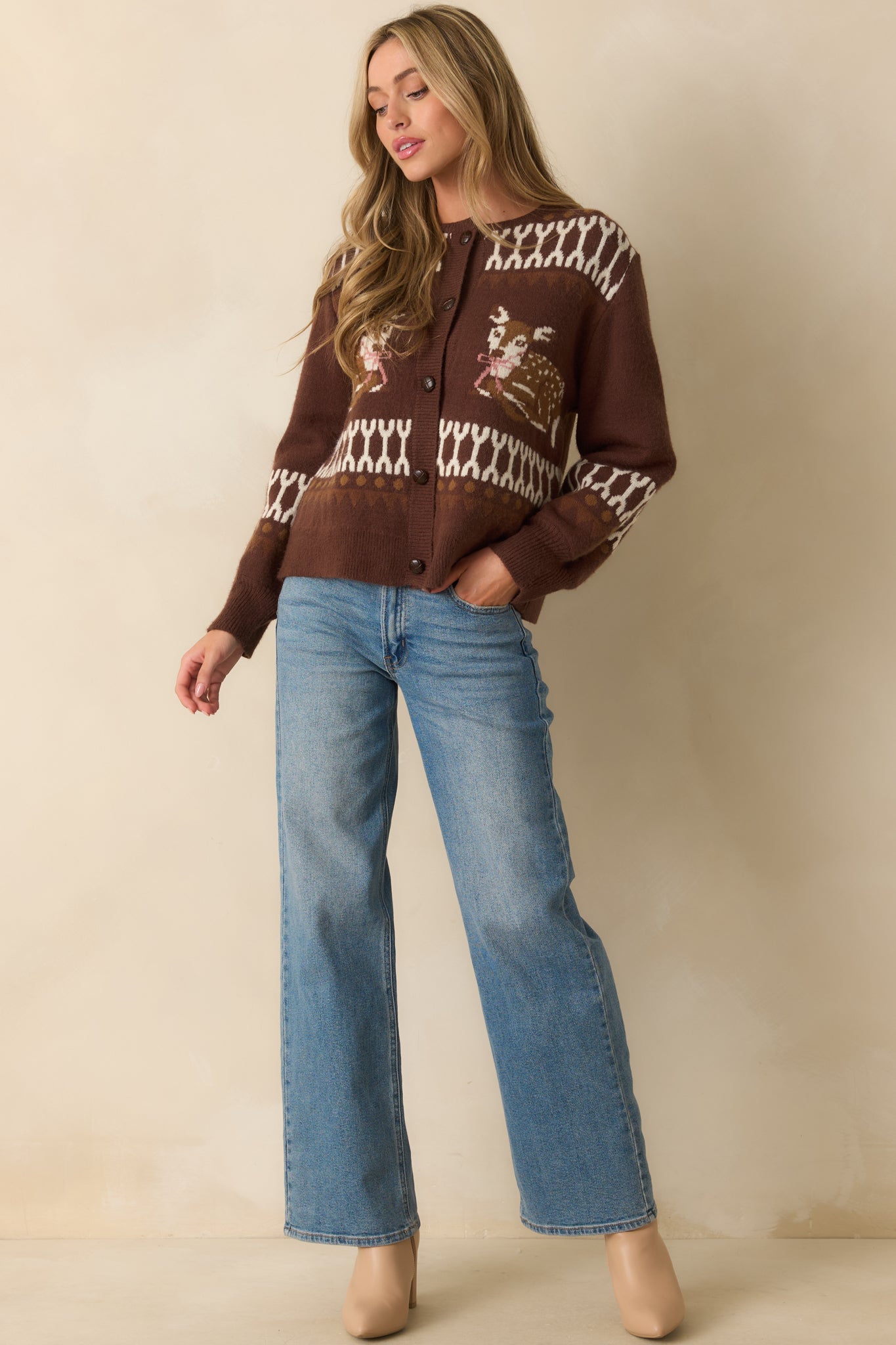 Front-facing brown cardigan showcasing deer motifs and a relaxed fit.