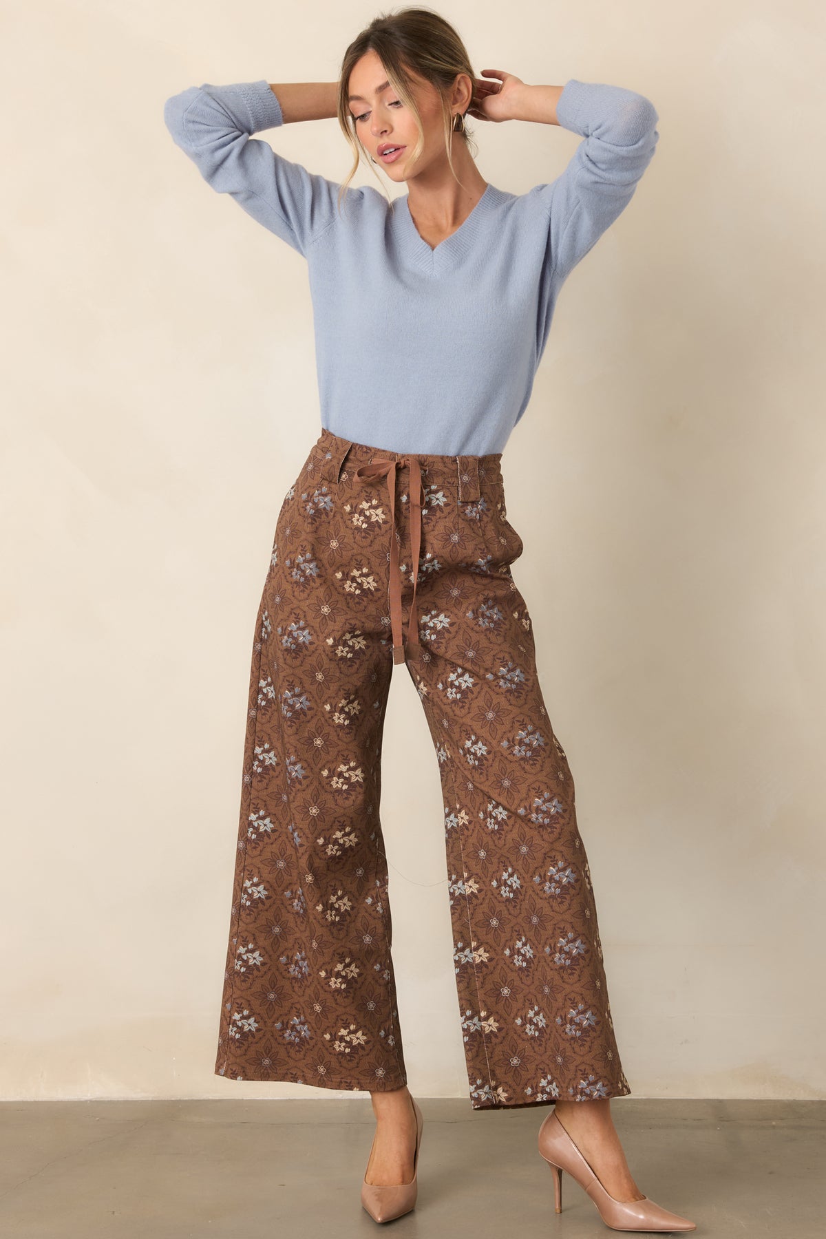 Brown cotton-blend pants with colorful medallion motifs, a casual drawstring tie, and cropped wide legs.