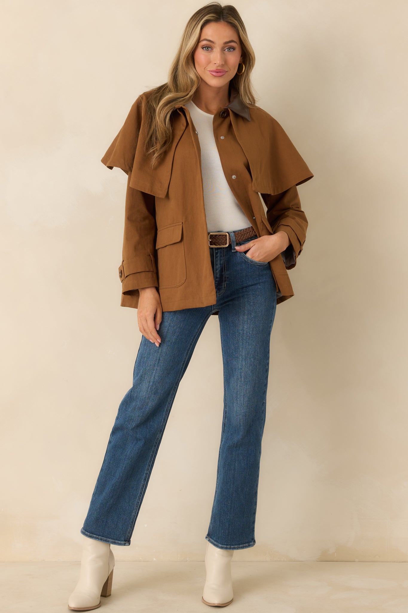 Brown cotton utility jacket with button-front closure and collared neckline, shown in a relaxed full-body front view.