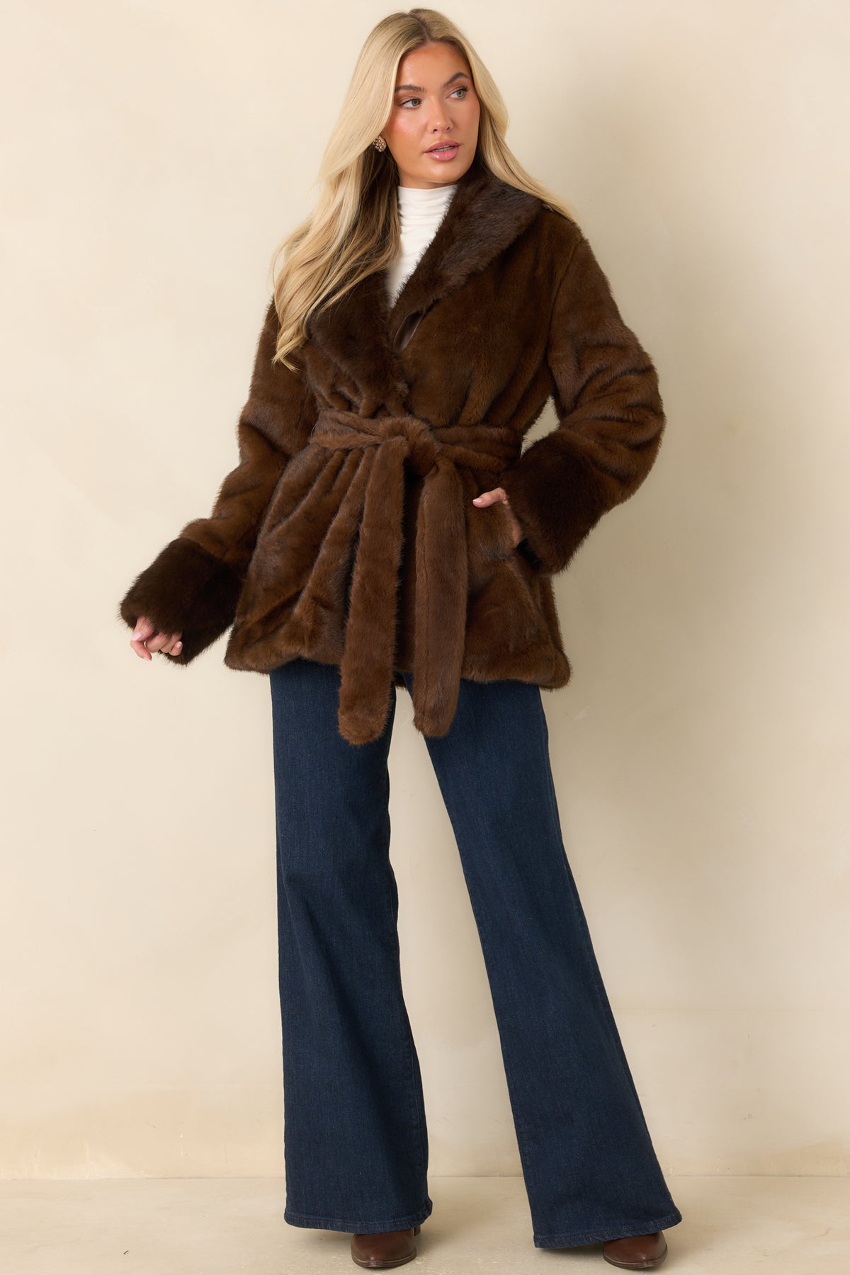 Rich brown faux fur coat with an oversized notched lapel collar, open front, and matching self-tie belt.