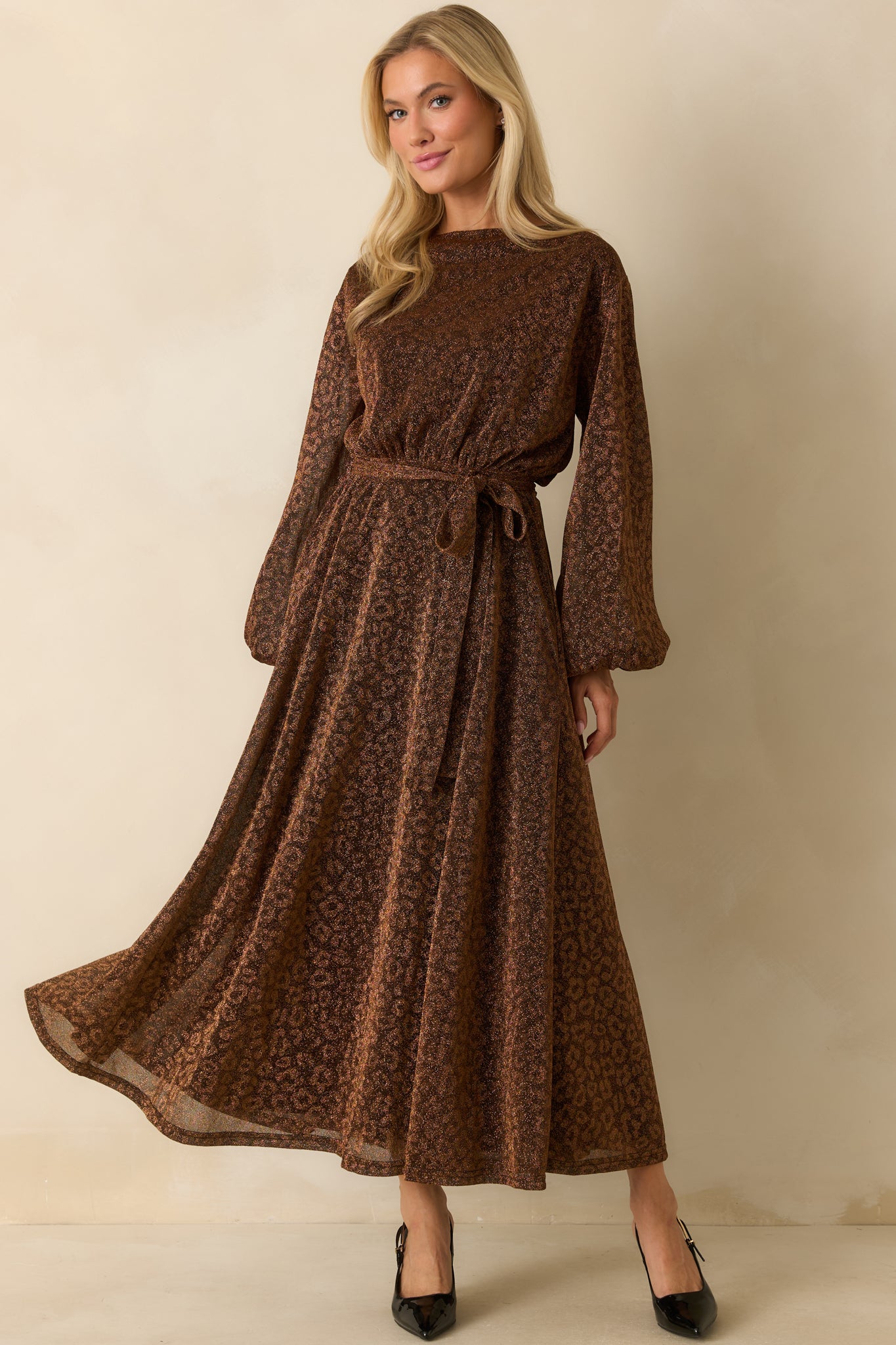 Lightweight brown midi dress with an elastic waist and removable tie belt creating a flattering silhouette