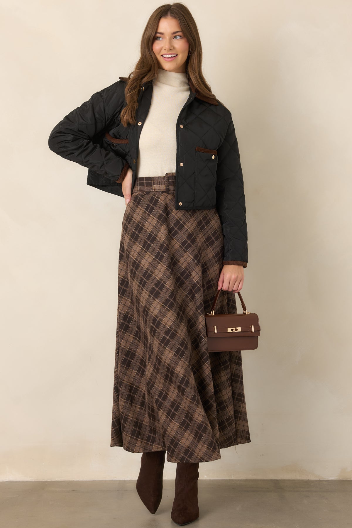 High-rise brown plaid maxi skirt highlighting the optional coordinating belt and softly structured waistband.