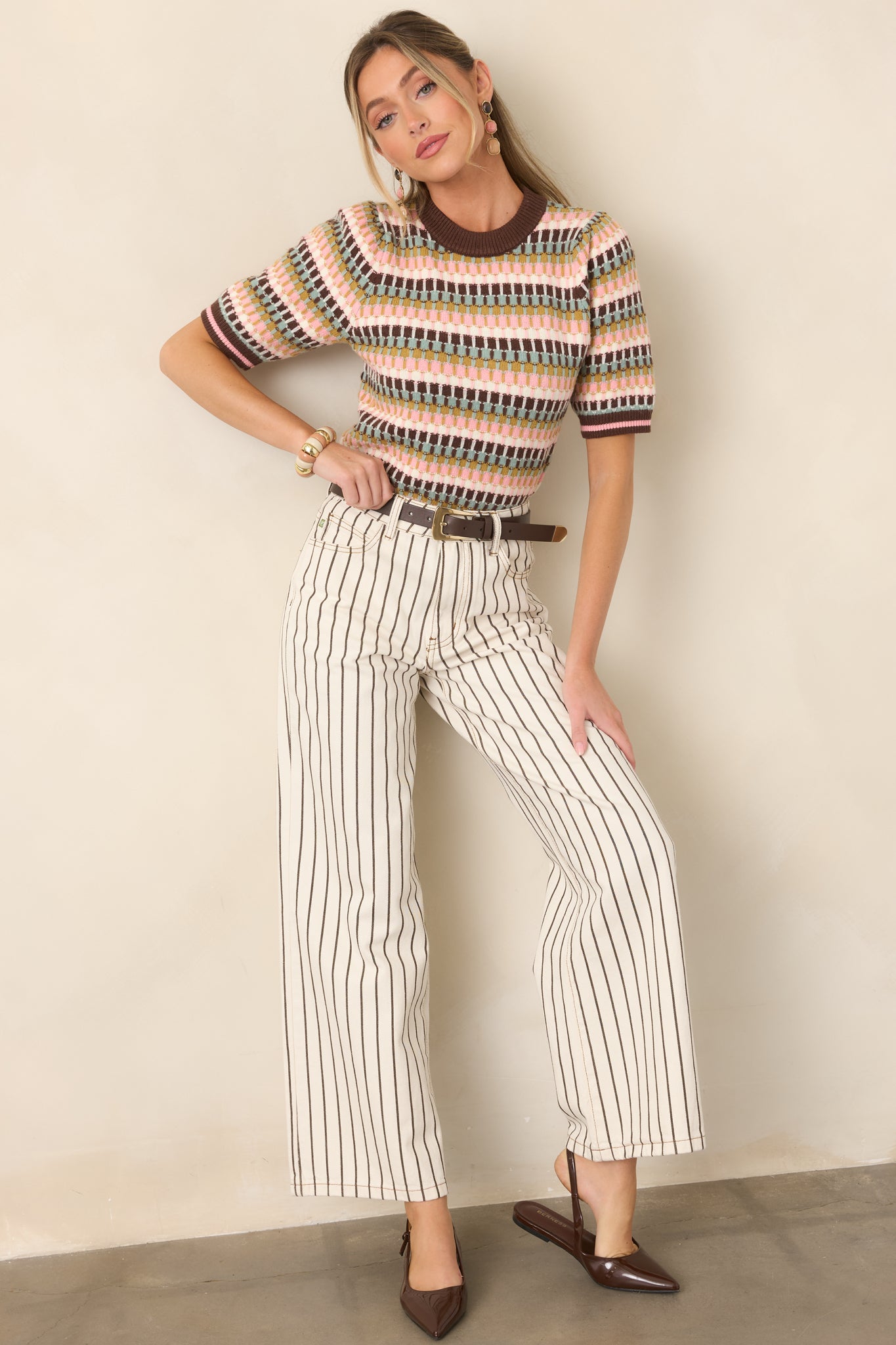 Textured striped top showcasing earthy brown and olive tones alongside sage, blush pink, and ivory, finished with contrasting ribbed edges.