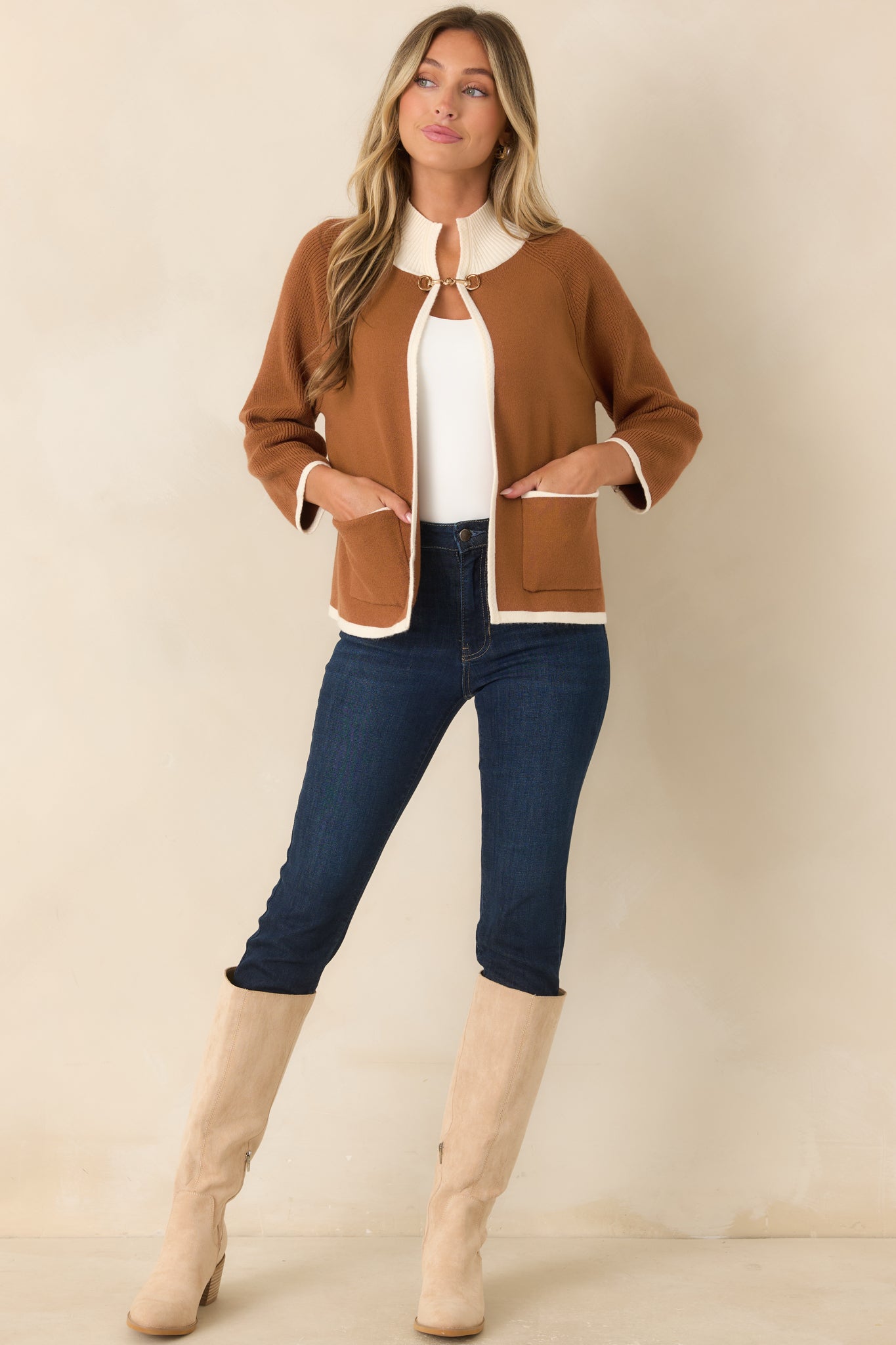 Soft viscose-blend knit cardigan showcasing a relaxed silhouette, open front, ivory ribbed edging, and polished gold-tone horsebit closure.