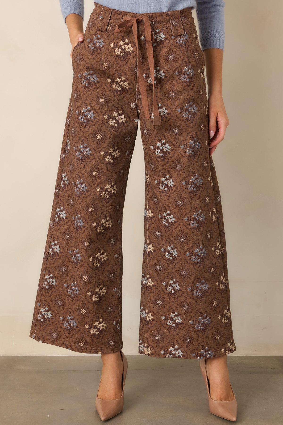 Cropped wide-leg pants with a drawstring waist, belt loops, and a smooth zip-fly front.