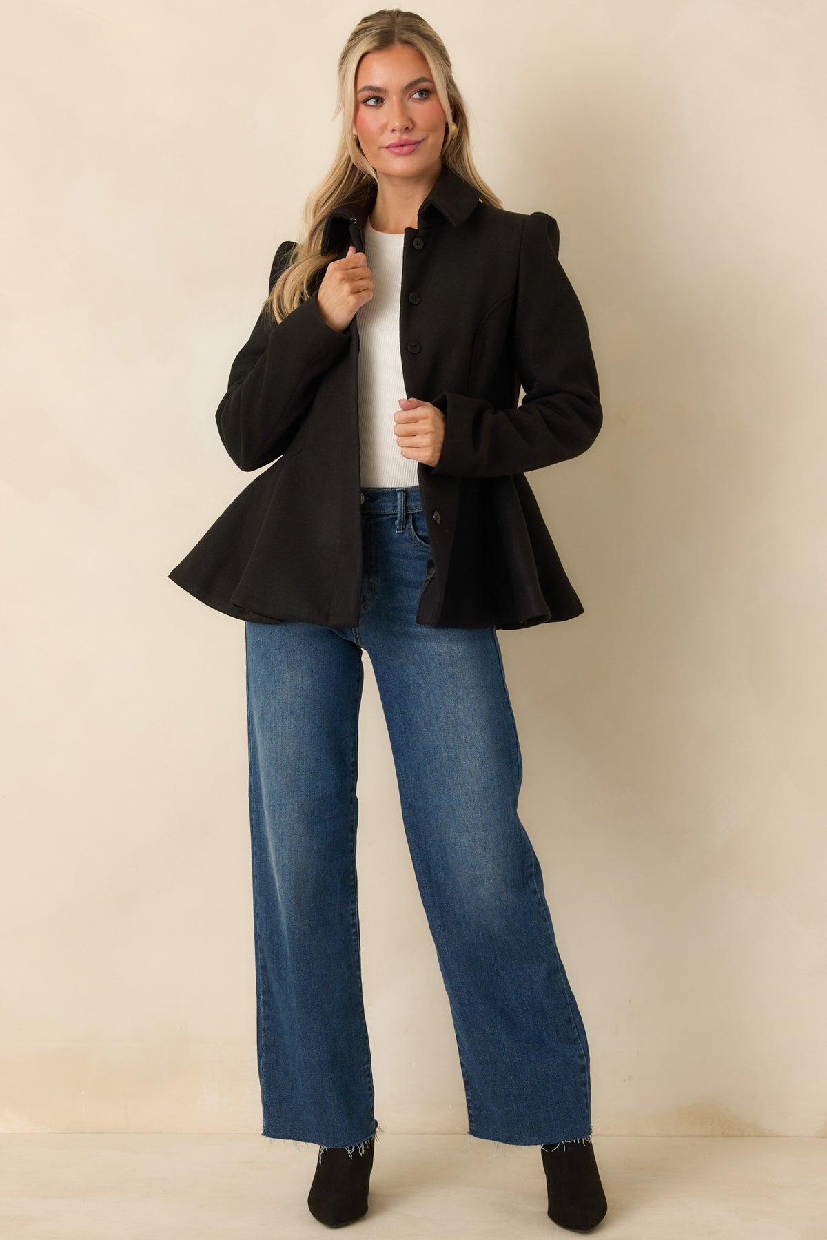Brushed felt jacket with curved bodice seams, pointed collar, and long sleeves.