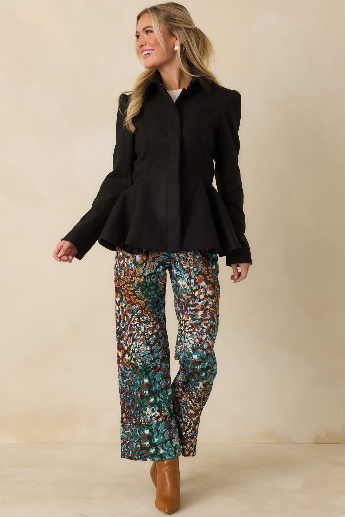 Brushed felt jacket with subtly puffed shoulders, long sleeves, and a concealed button front.