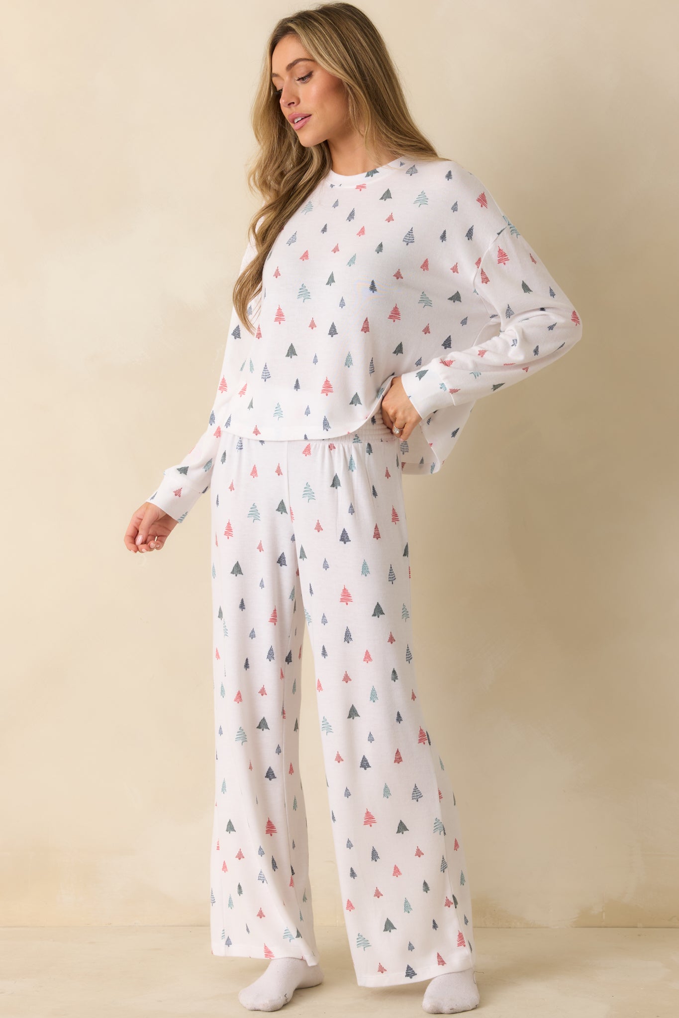 Brushed sweater knit pajama top in white with full-length sleeves, relaxed fit, and alpine tree motif throughout.