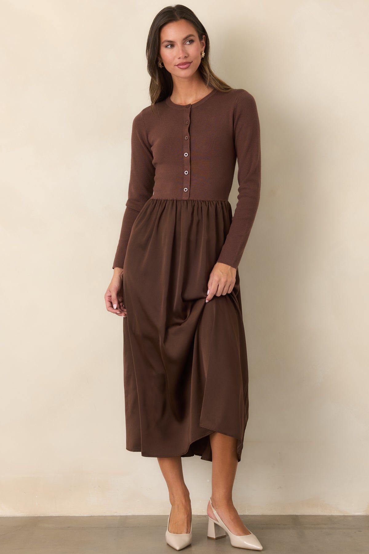 Burgundy midi dress with a classic knit upper and contrasting lustrous gathered skirt.