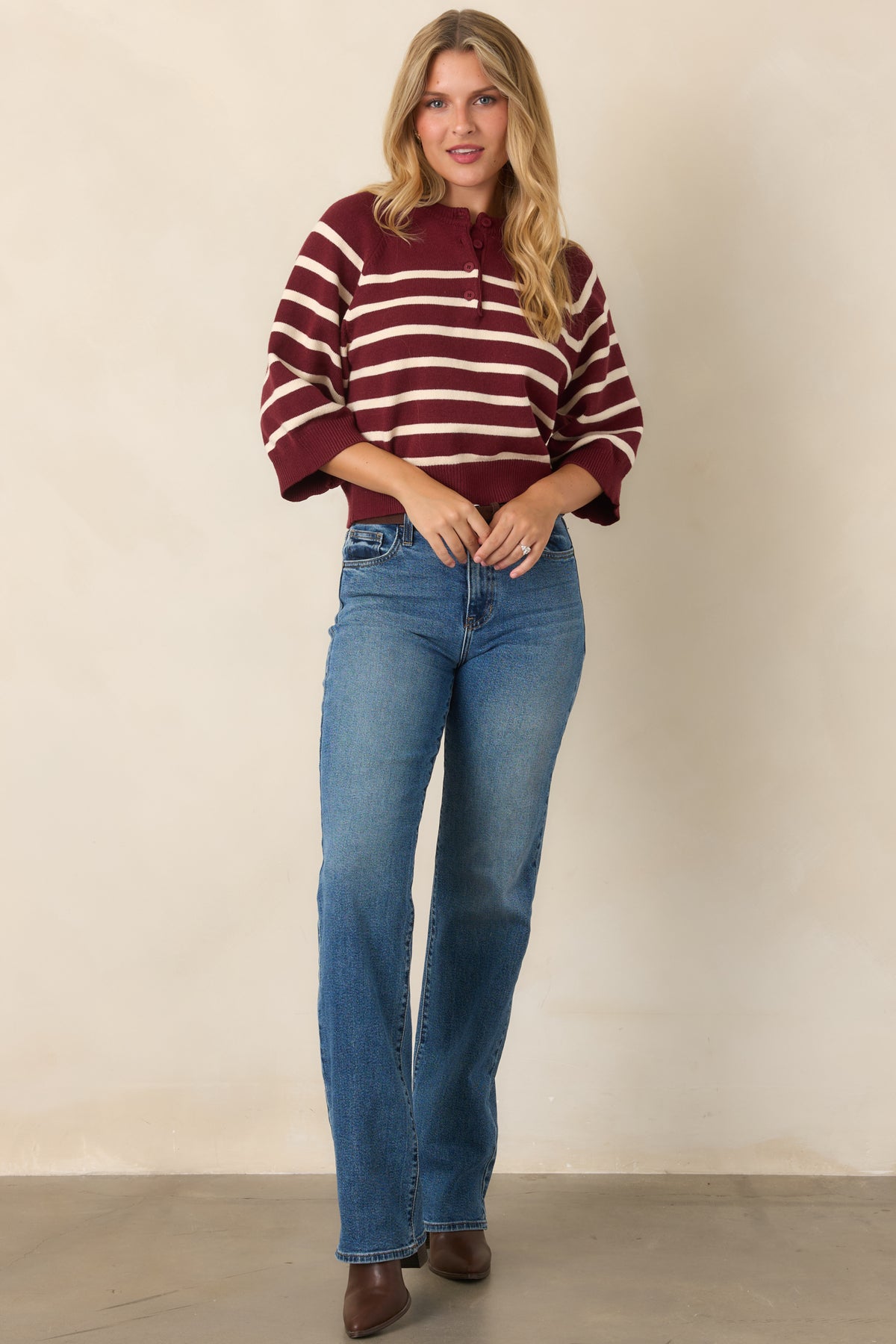 Relaxed burgundy and ivory top with a slightly boxy silhouette and ribbed trim.