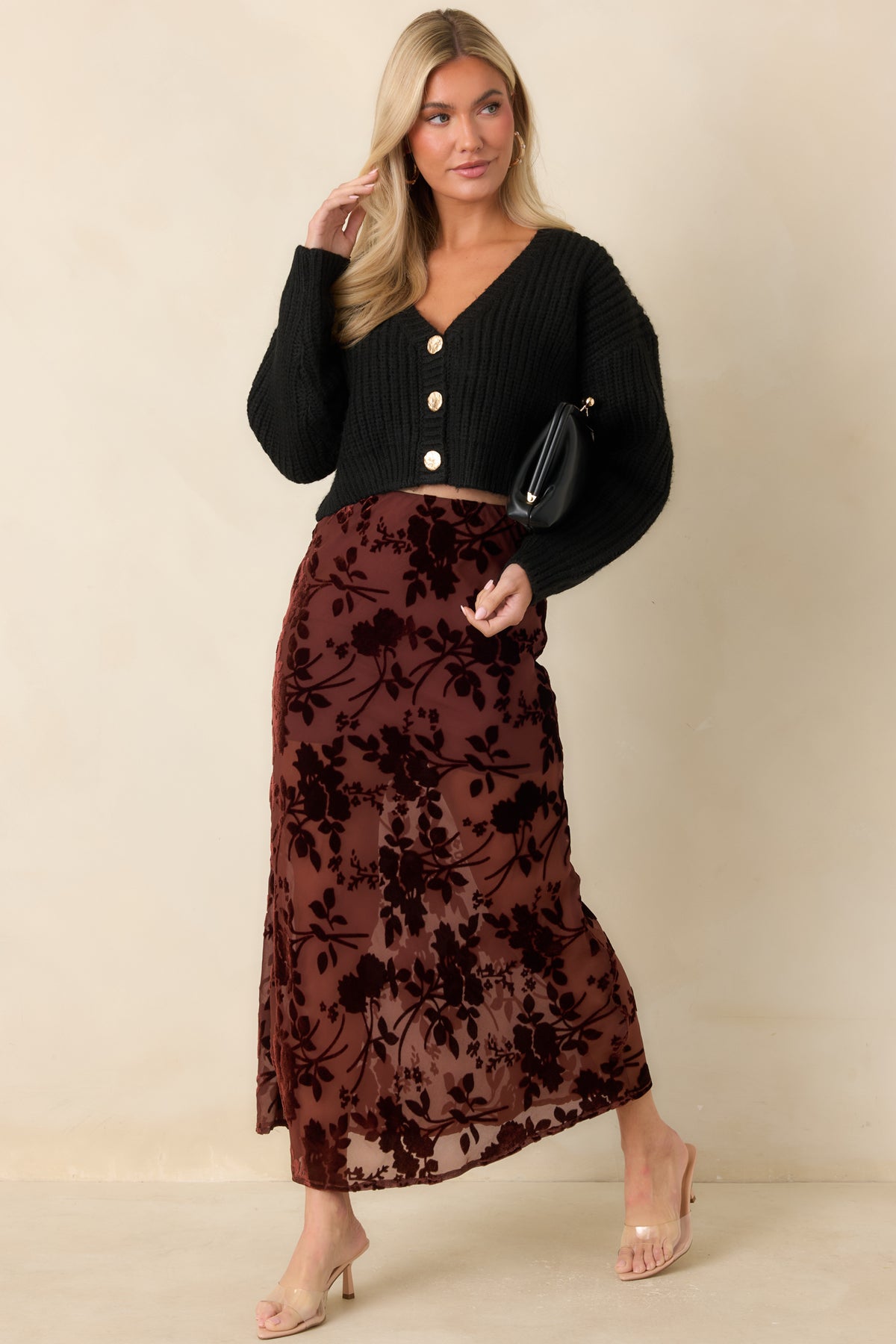 Burgundy midi skirt with an allover floral velvet burnout pattern over a sheer mesh base.