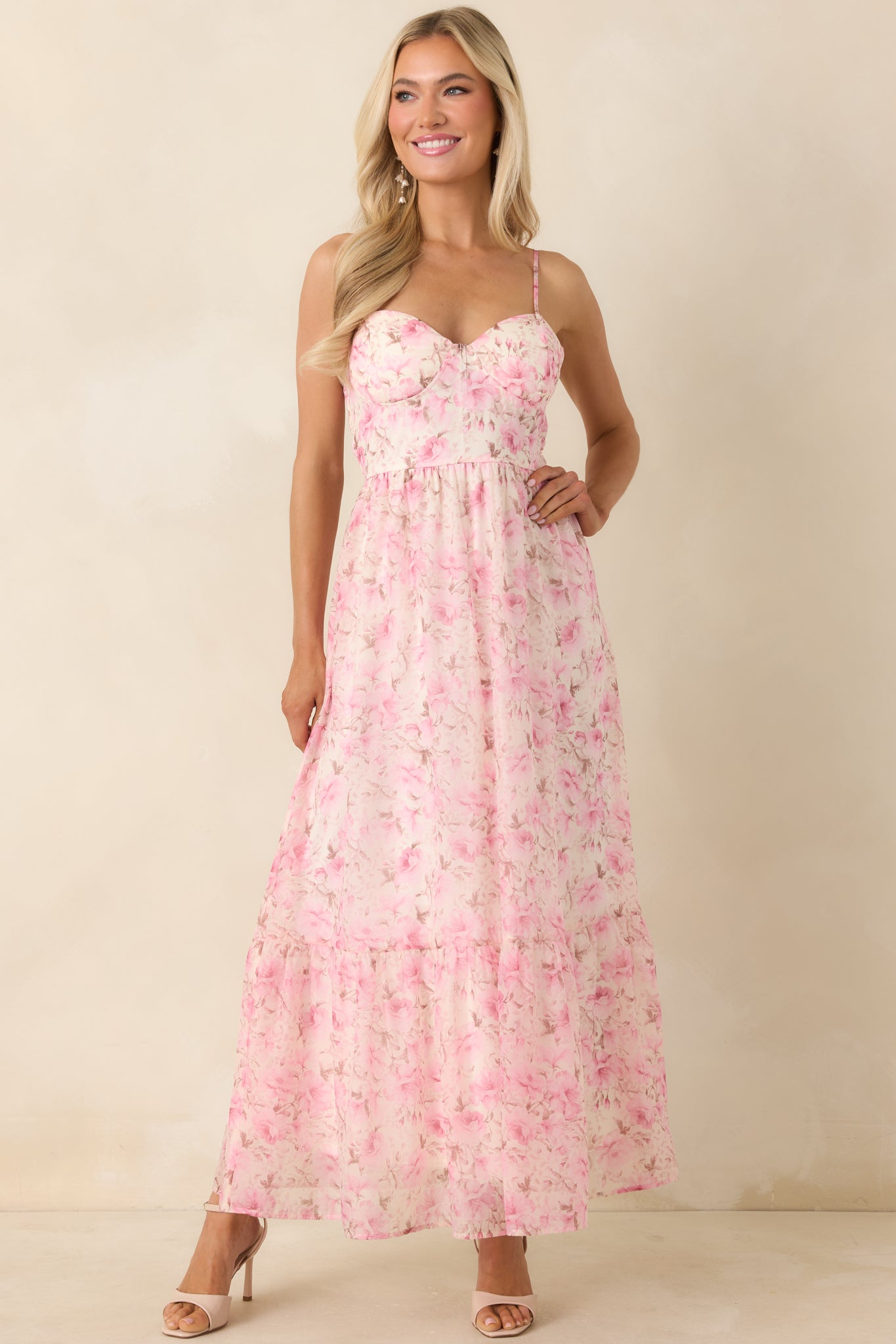 Bustier bodice midi dress in pink floral print with airy, relaxed drape.