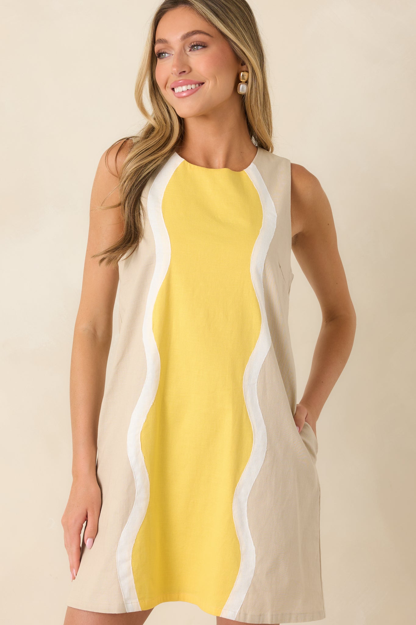 Front close-up featuring the butter yellow center panel, ivory wave design, and smooth round neckline.
