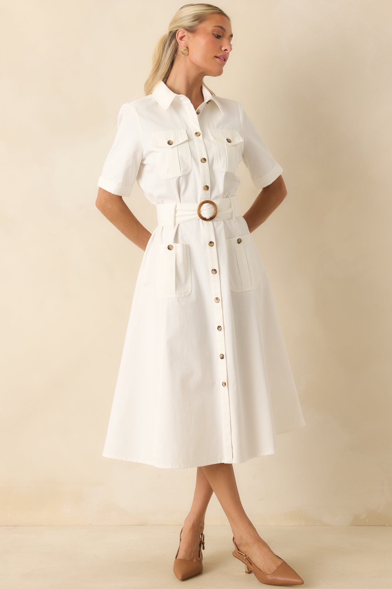 Button-front cotton twill midi dress showcasing a tailored collar, defined waist, and polished cuffed sleeve details.