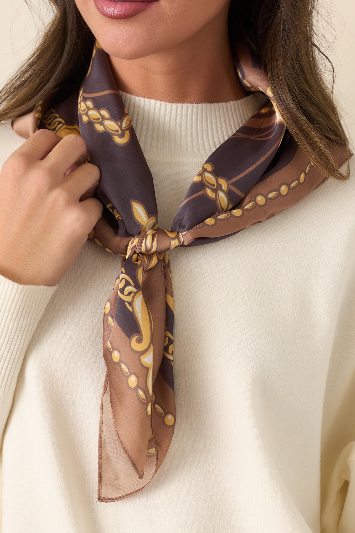  Camel and charcoal grey scarf with an ornate vintage-inspired chain and medallion print.
