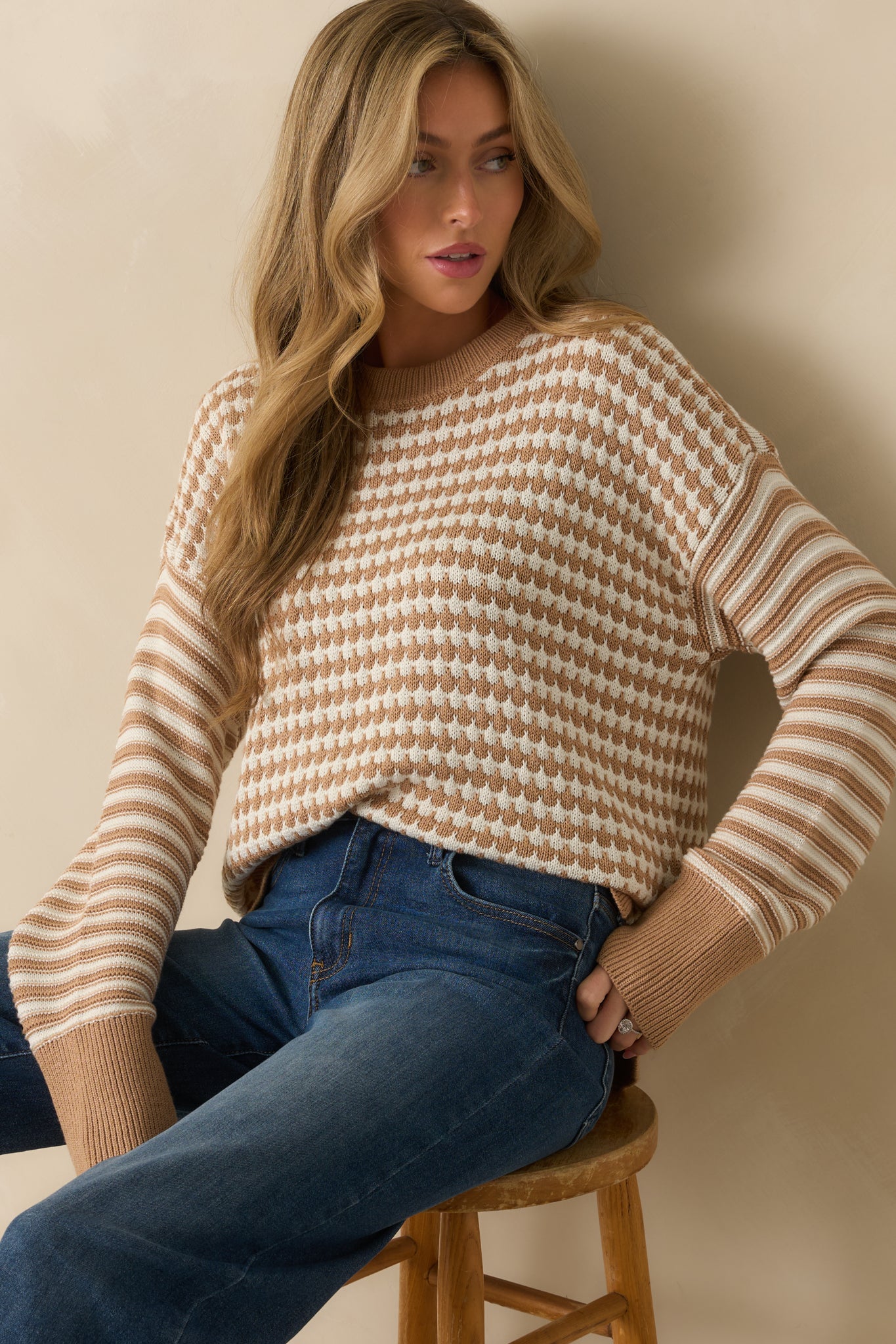 Long-sleeve crewneck sweater in camel featuring mixed-stitch design and ribbed hems.