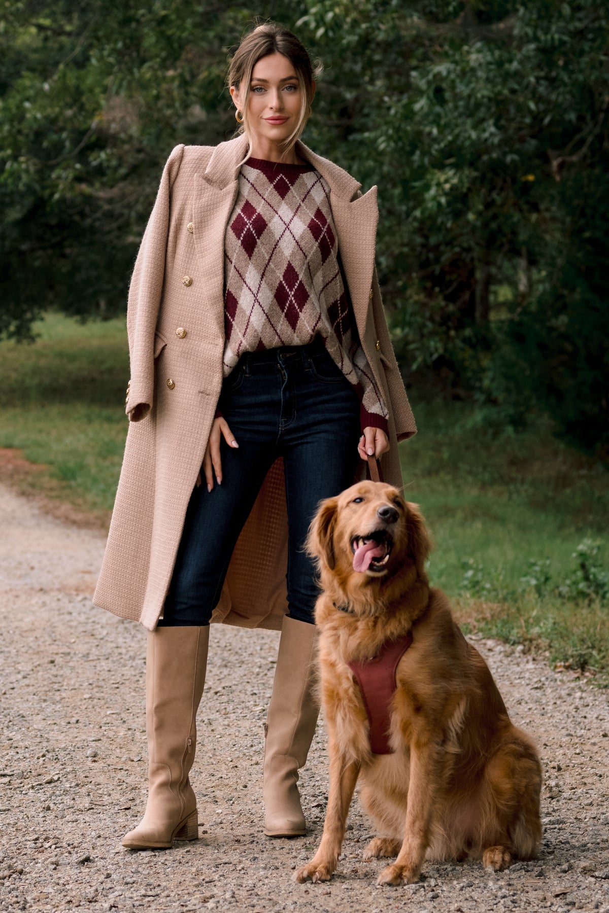Camel topcoat with a structured double-breasted silhouette, notched lapels, gold-tone buttons, and long sleeves.