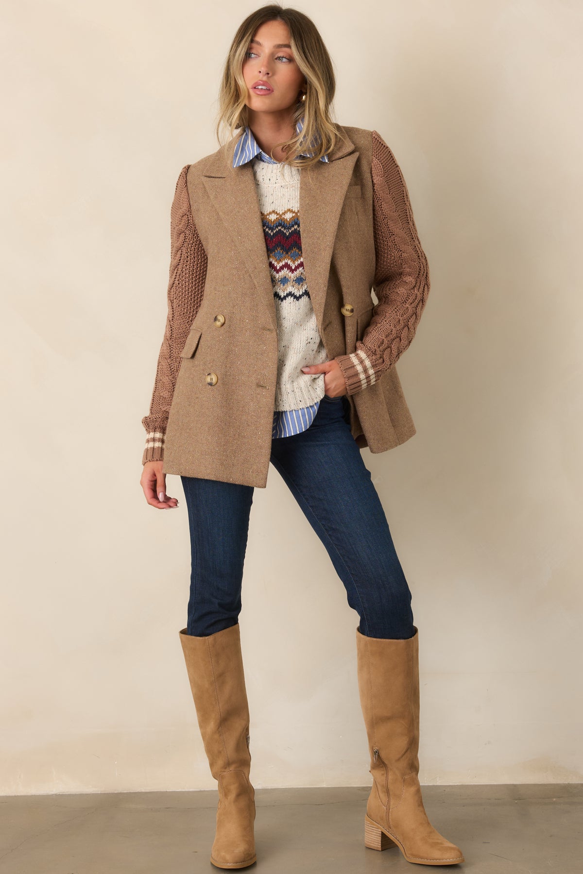 Camel wool-blend blazer with a structured double-breasted front, notched lapels, and contrasting cable-knit sleeves.