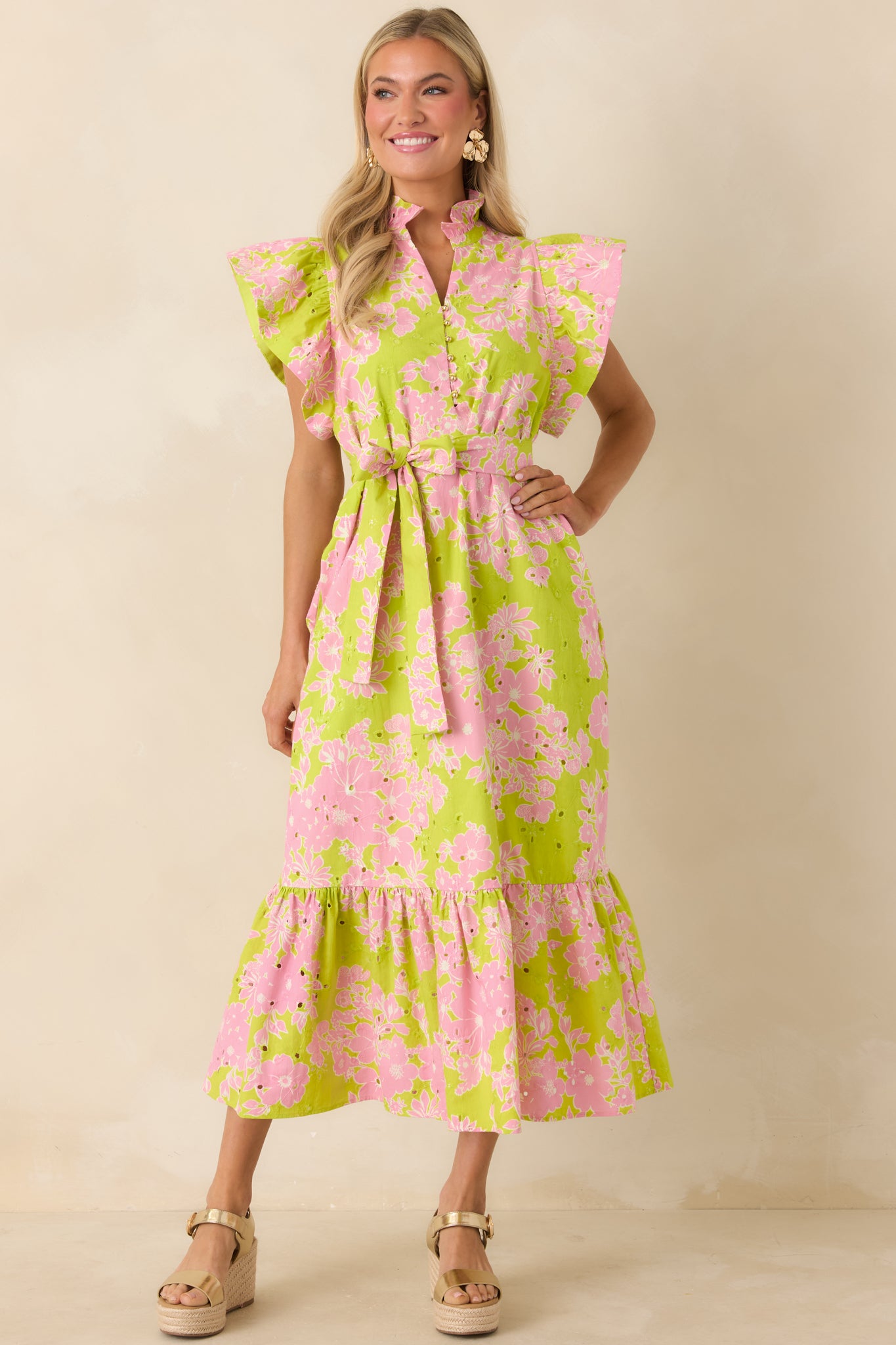 Chartreuse and pink dress with side pockets, defined waist, and lightweight cotton fabric.