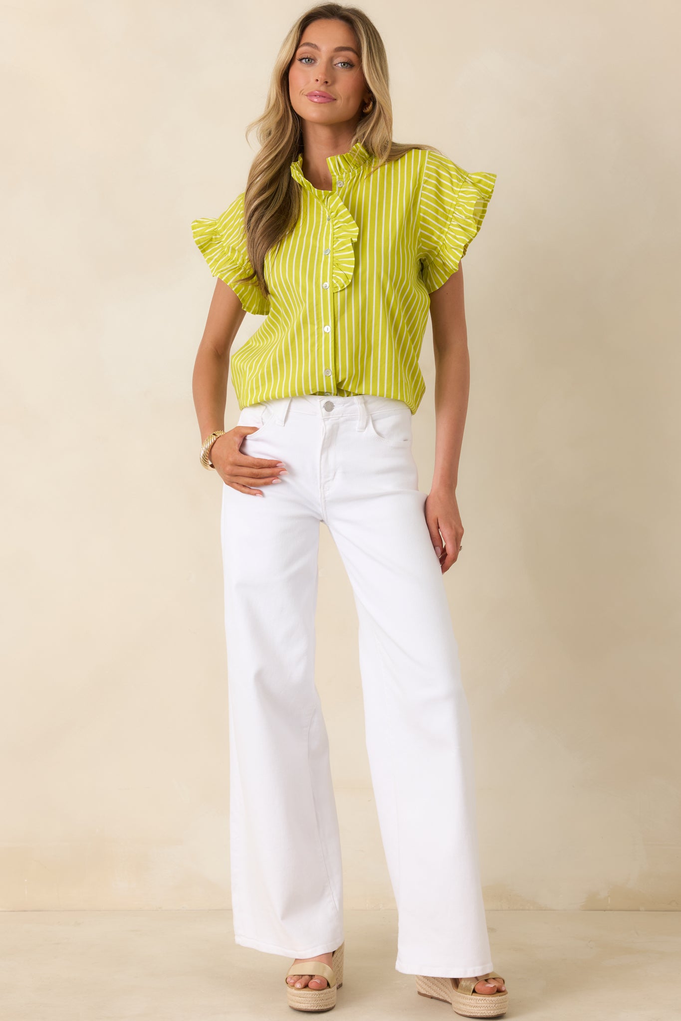 Chartreuse and white top with softly ruffled neckline, flutter sleeves, and relaxed fit.