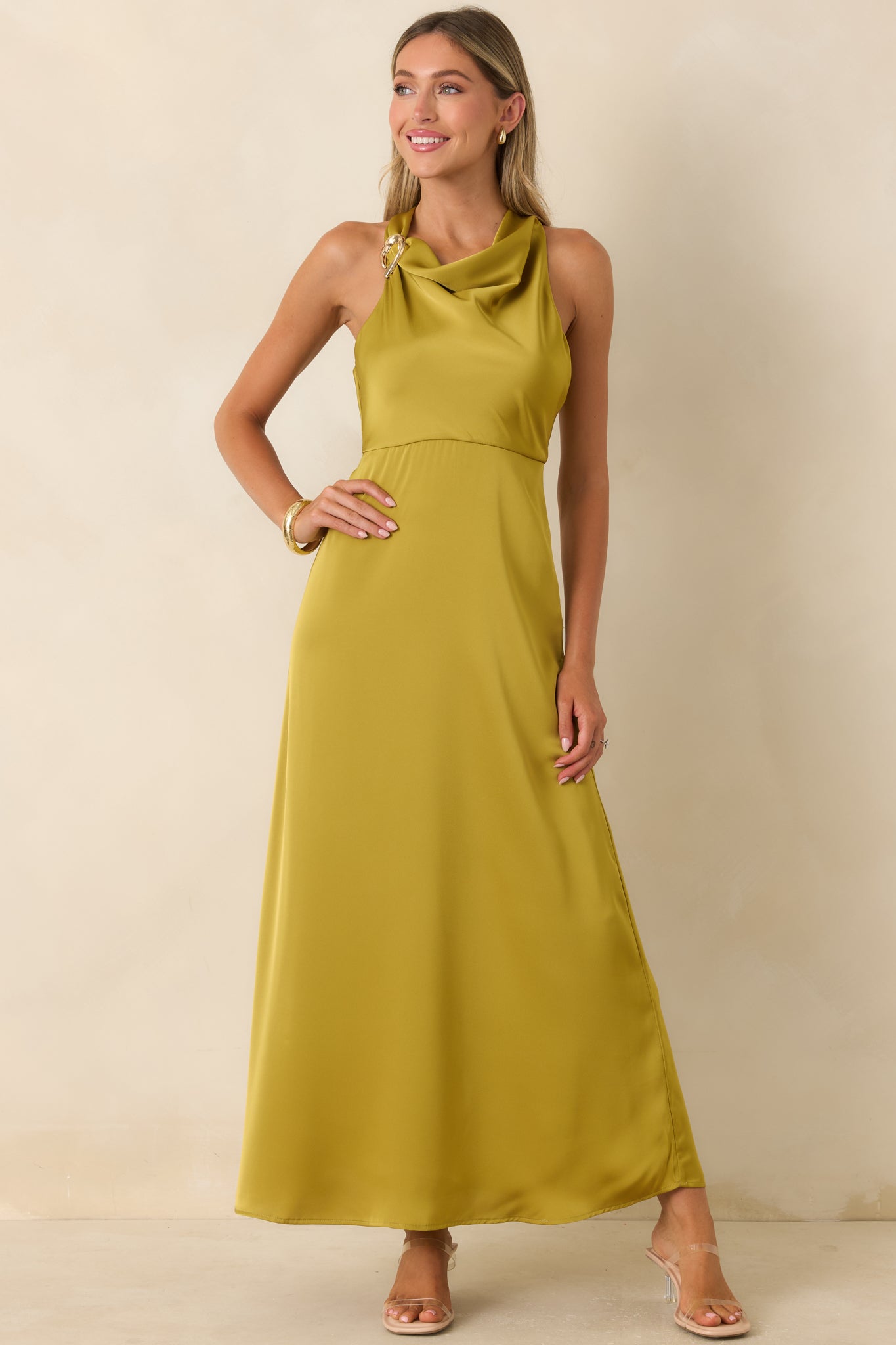 Chartreuse evening dress with a draped neckline, lined bodice, and smooth empire waist silhouette.