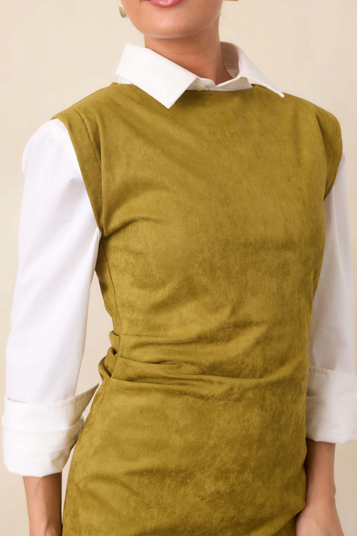 Close-up of the chartreuse faux suede-like texture and dimensional ruching at the waist.
