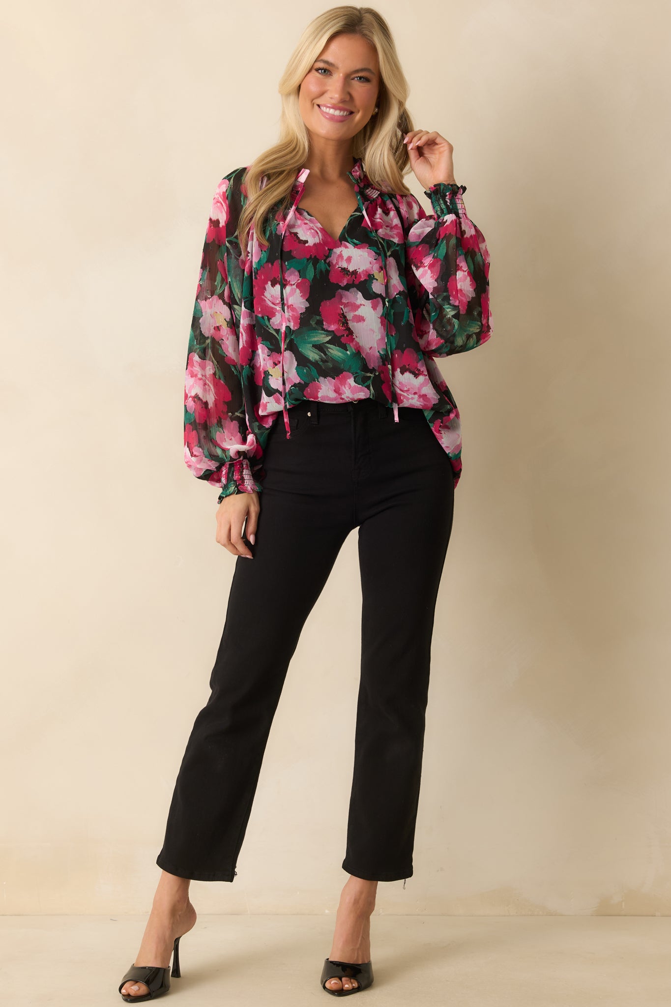 Front-facing lightweight chiffon top highlighting long sheer sleeves with smocked cuffs and vibrant painterly print.