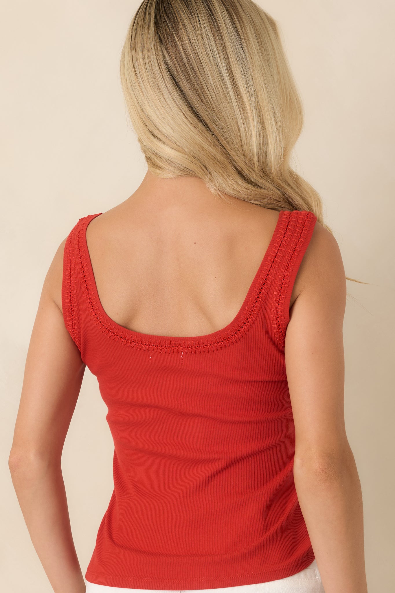 Back view of the chili pepper red fitted tank highlighting the wide shoulder straps and clean silhouette.