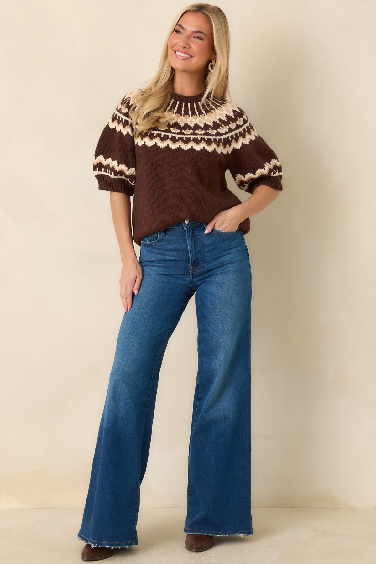 Chocolate brown knit top with a cream and caramel Fair Isle pattern across the shoulders and upper bodice.