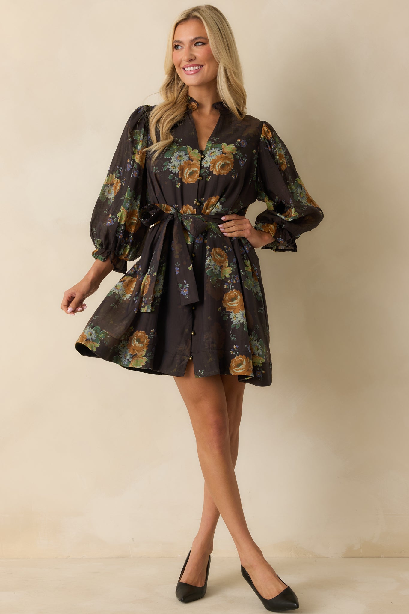 Mini dress in chocolate brown featuring puff sleeves, ruffled cuffs, and a relaxed silhouette.