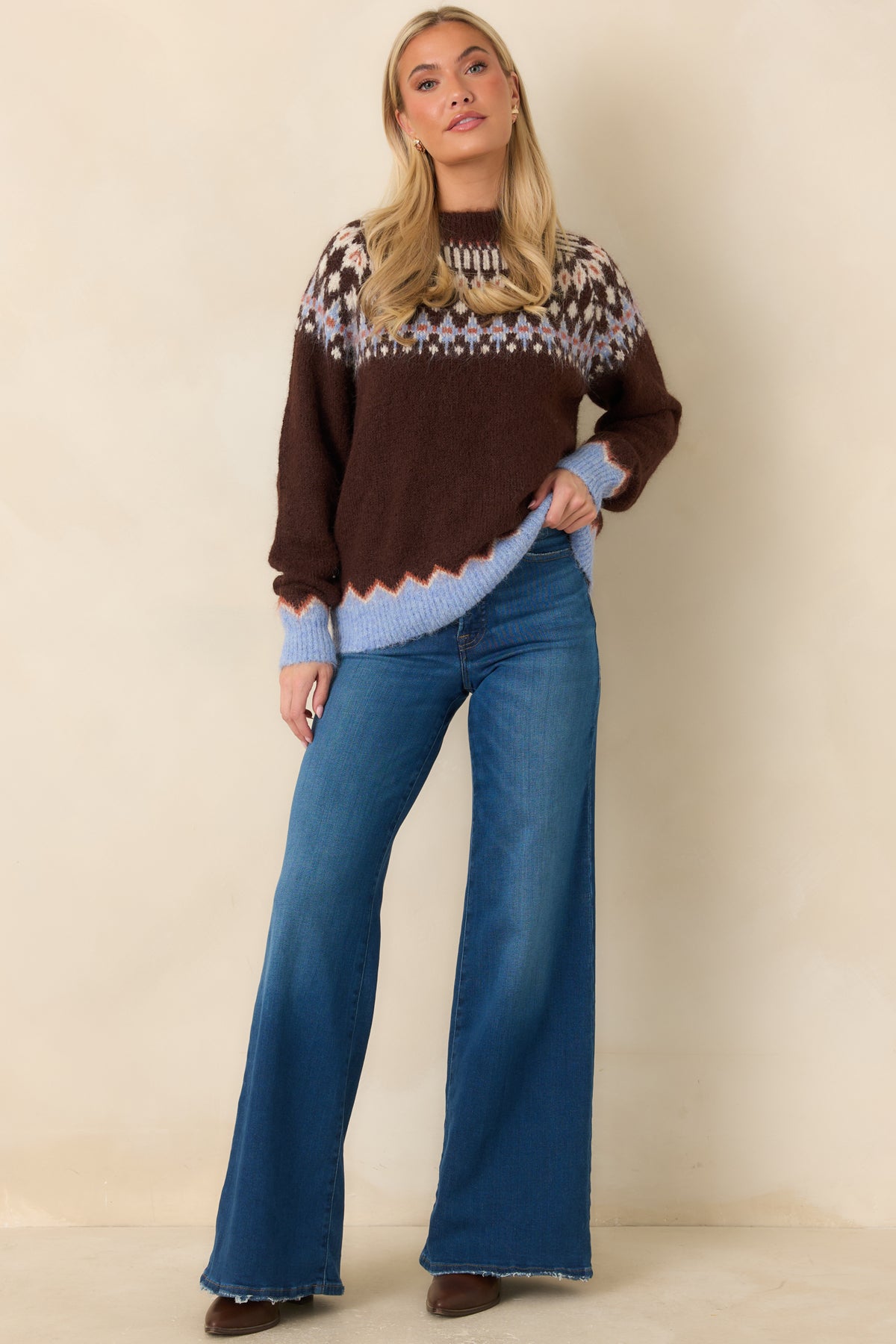 Relaxed chocolate brown sweater with a patterned shoulder yoke and roomy long sleeves.